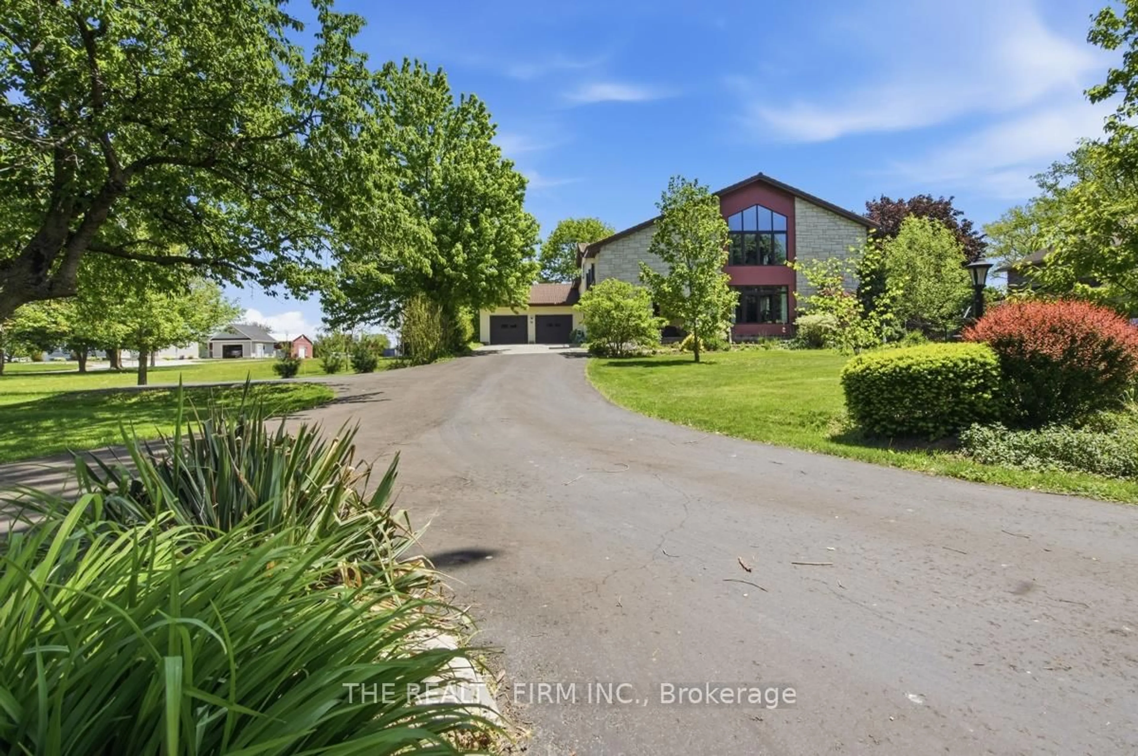 A pic from outside/outdoor area/front of a property/back of a property/a pic from drone, water/lake/river/ocean view for 15 Beechwood Ave, Lambton Shores Ontario N0N 1J0