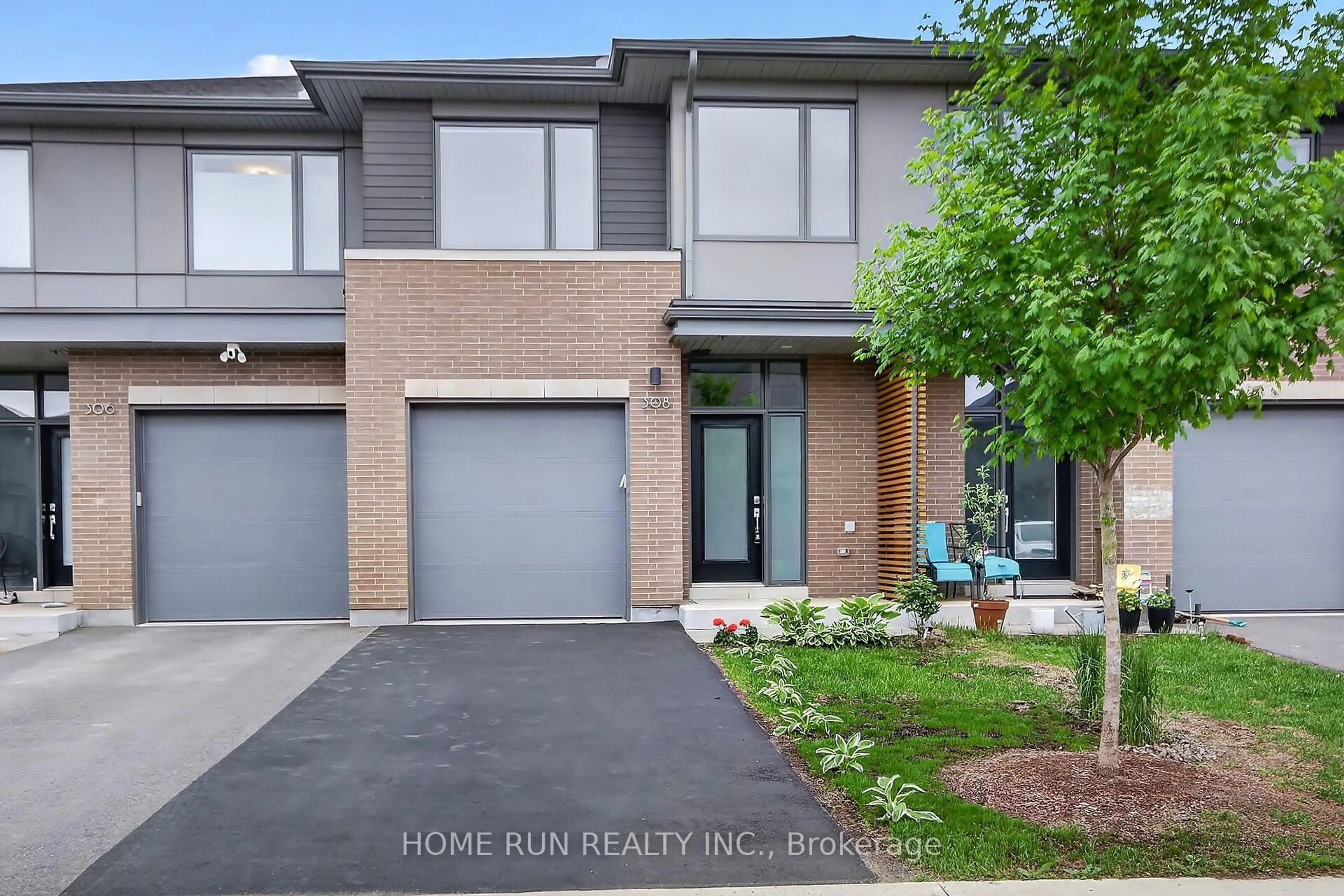 Home with brick exterior material, street for 308 WIGWAS St, Ottawa Ontario K1K 5A1