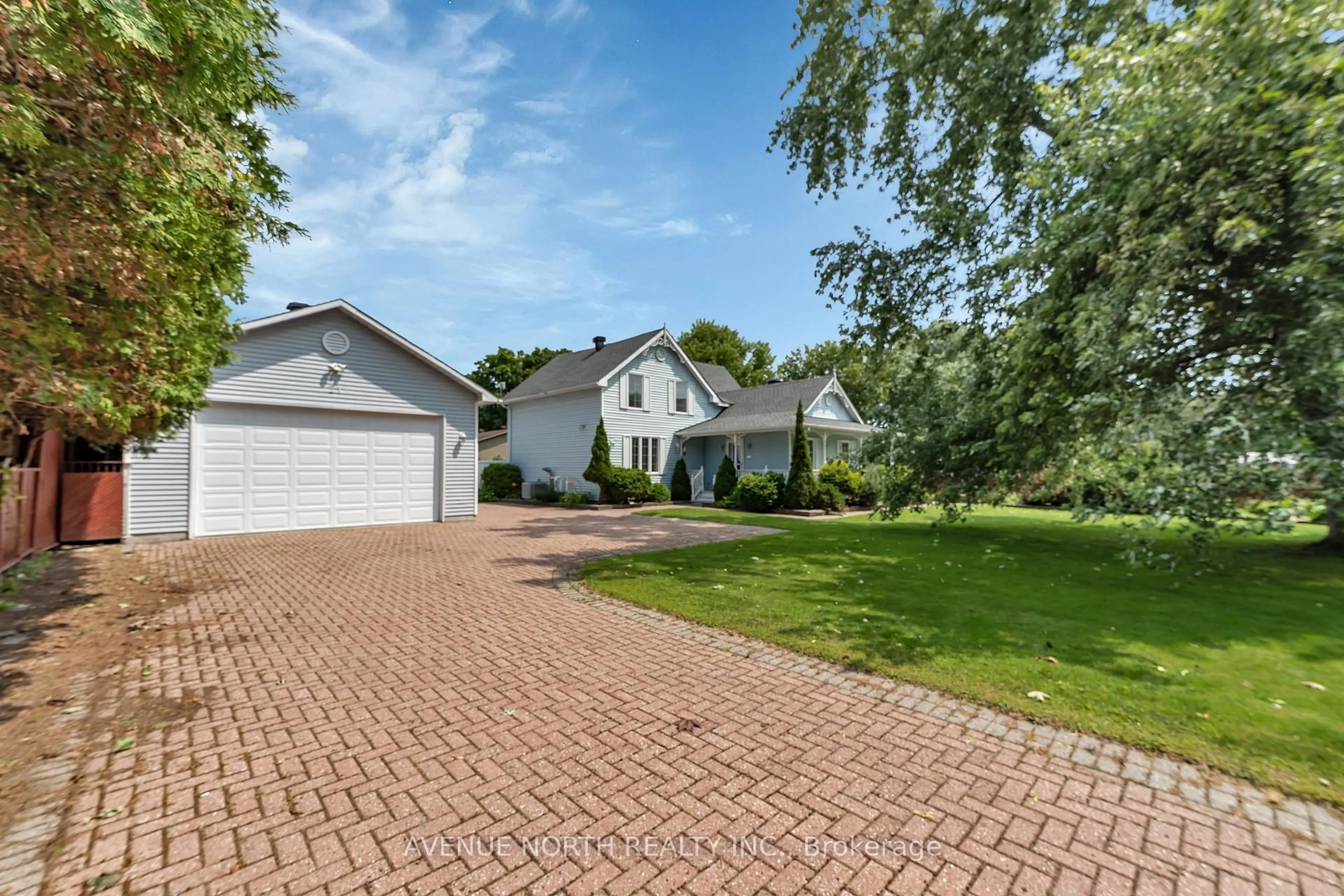 A pic from outside/outdoor area/front of a property/back of a property/a pic from drone, street for 21 Pilon St, Russell Ontario K0A 1W0