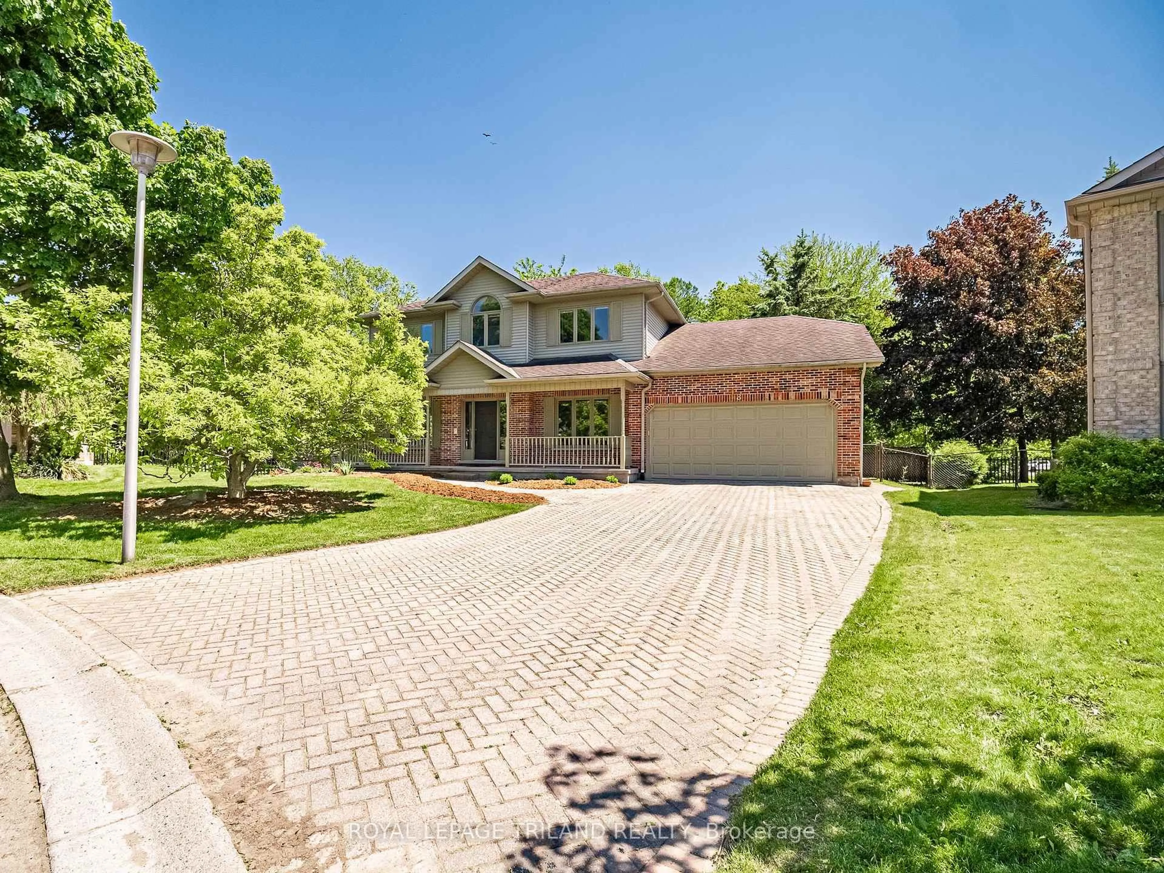 Home with brick exterior material, street for 18 Angus Crt, London North Ontario N5X 3J4