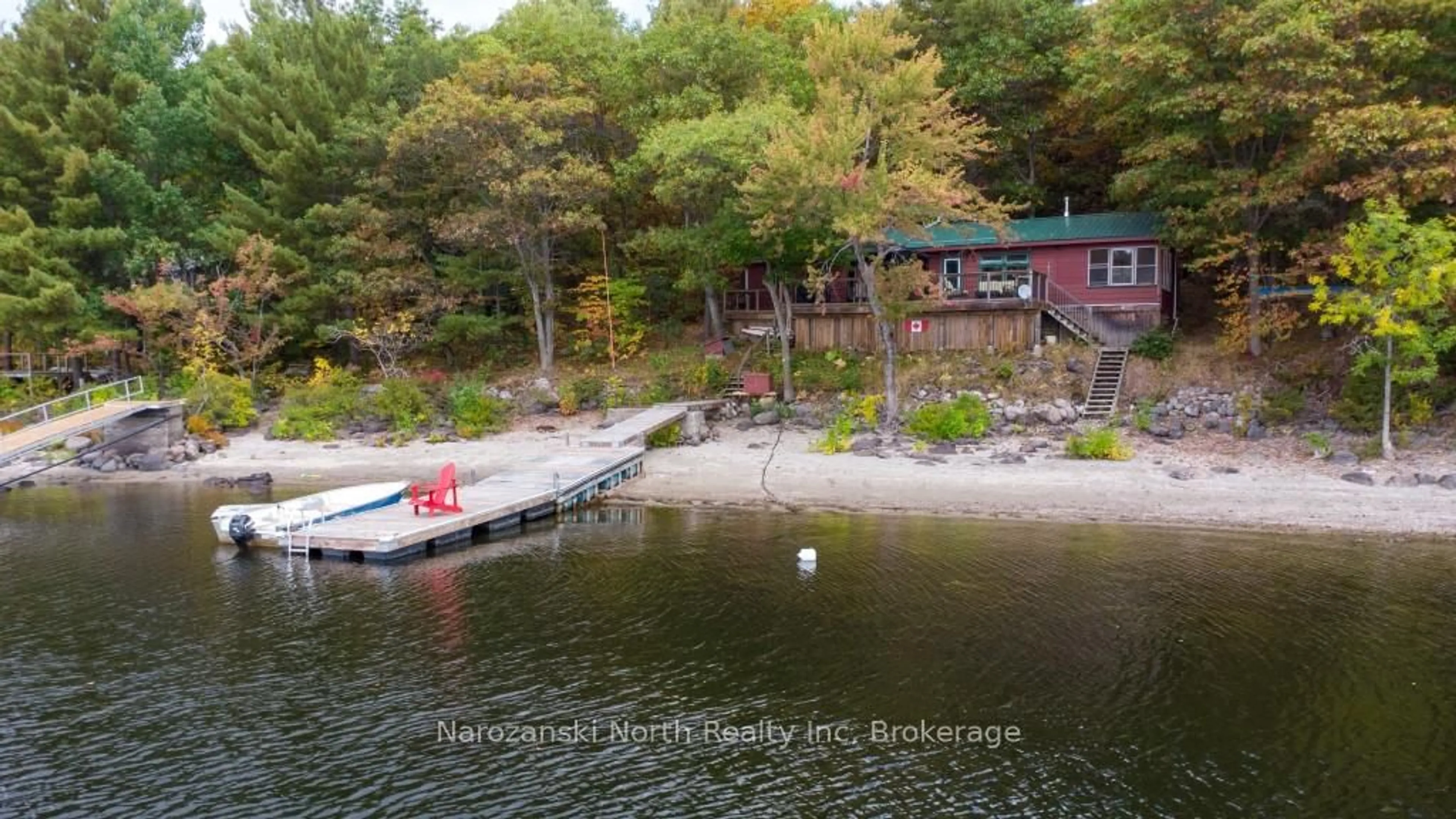 A pic from outside/outdoor area/front of a property/back of a property/a pic from drone, water/lake/river/ocean view for 23 four Mile Island, French River Ontario P0M 1A0