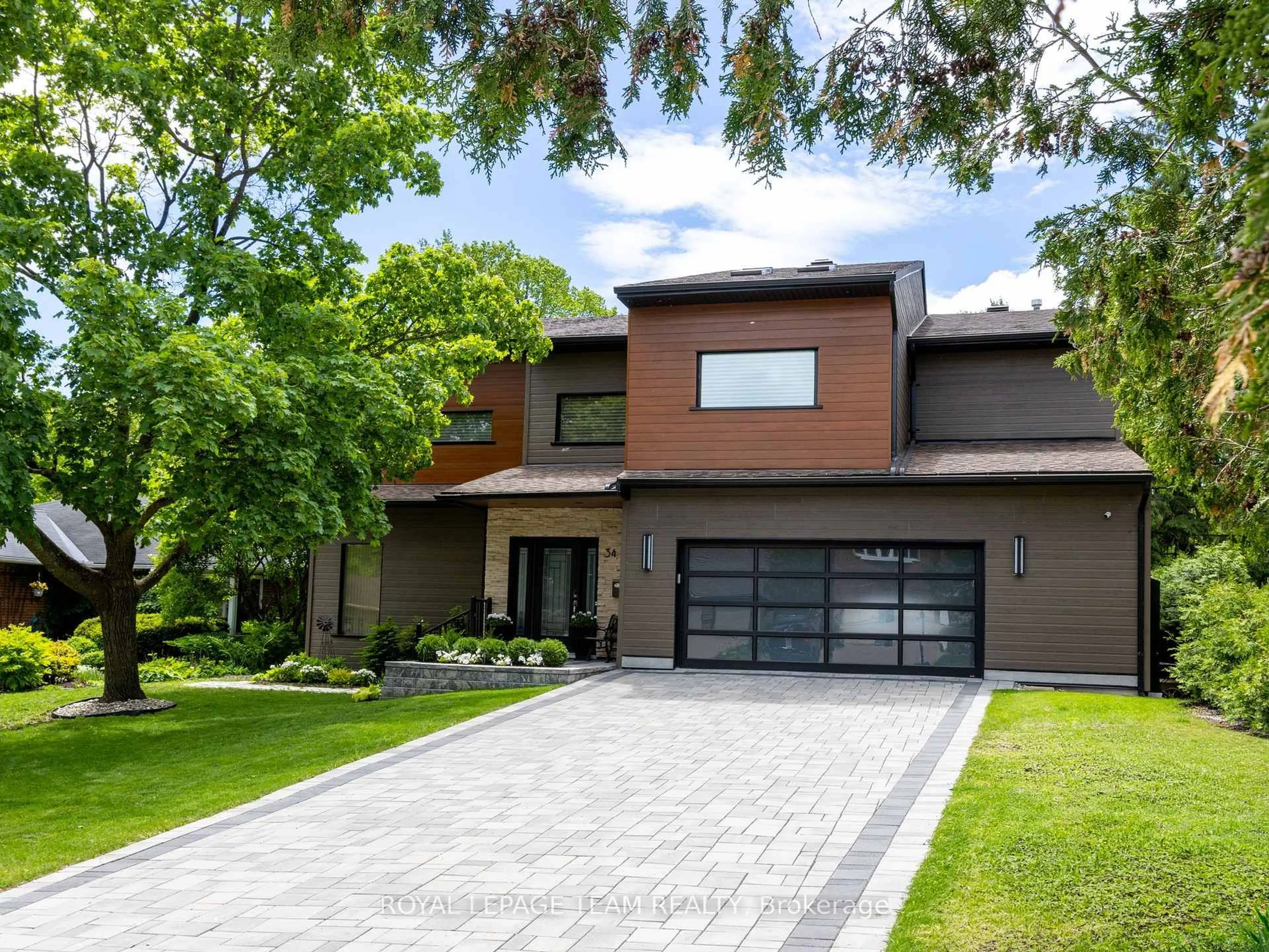 Home with brick exterior material, street for 34 Rideauview Terr, Ottawa Ontario K2C 3R9