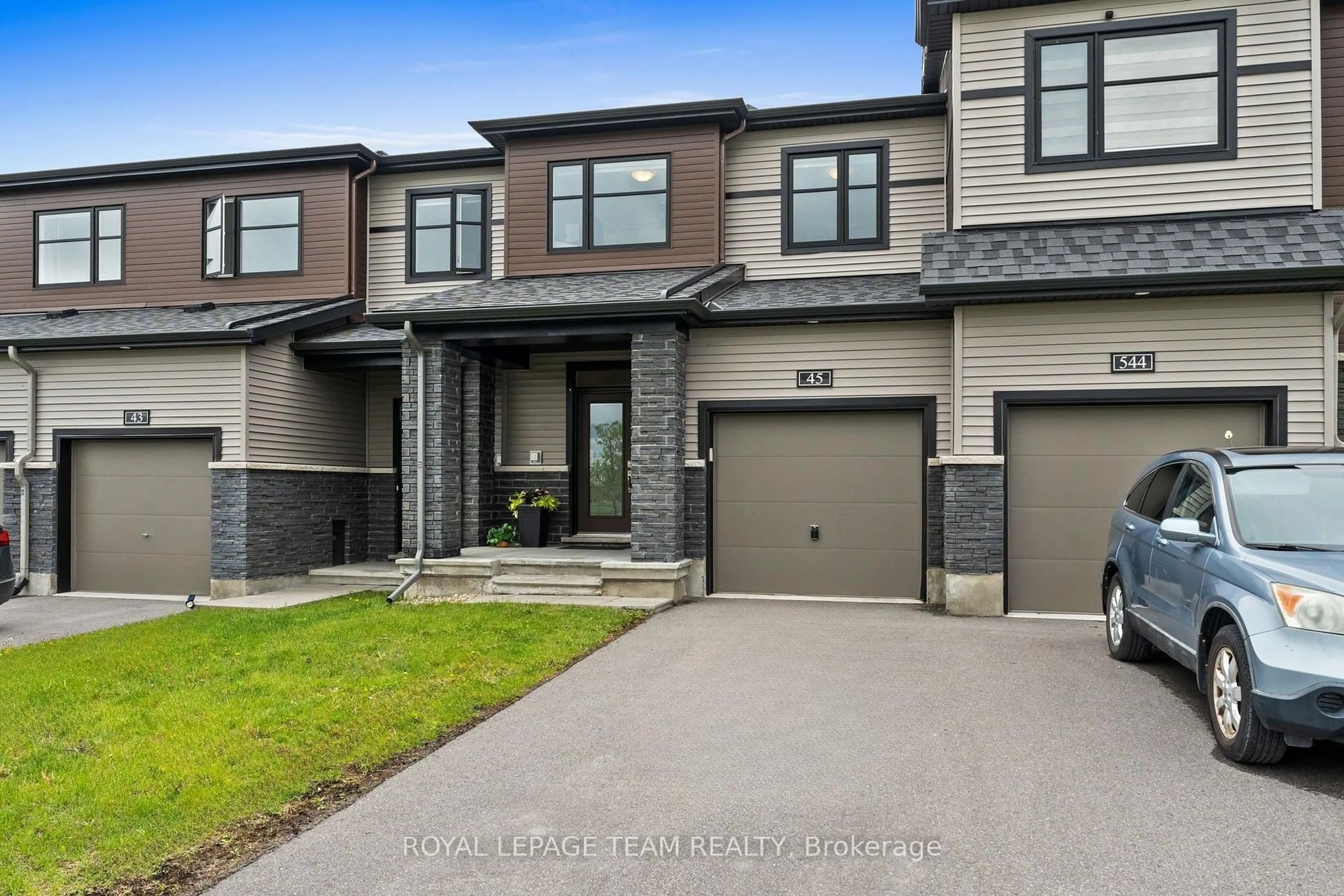 Home with brick exterior material, street for 45 Finglas Crt, Ottawa Ontario K2J 6Y6