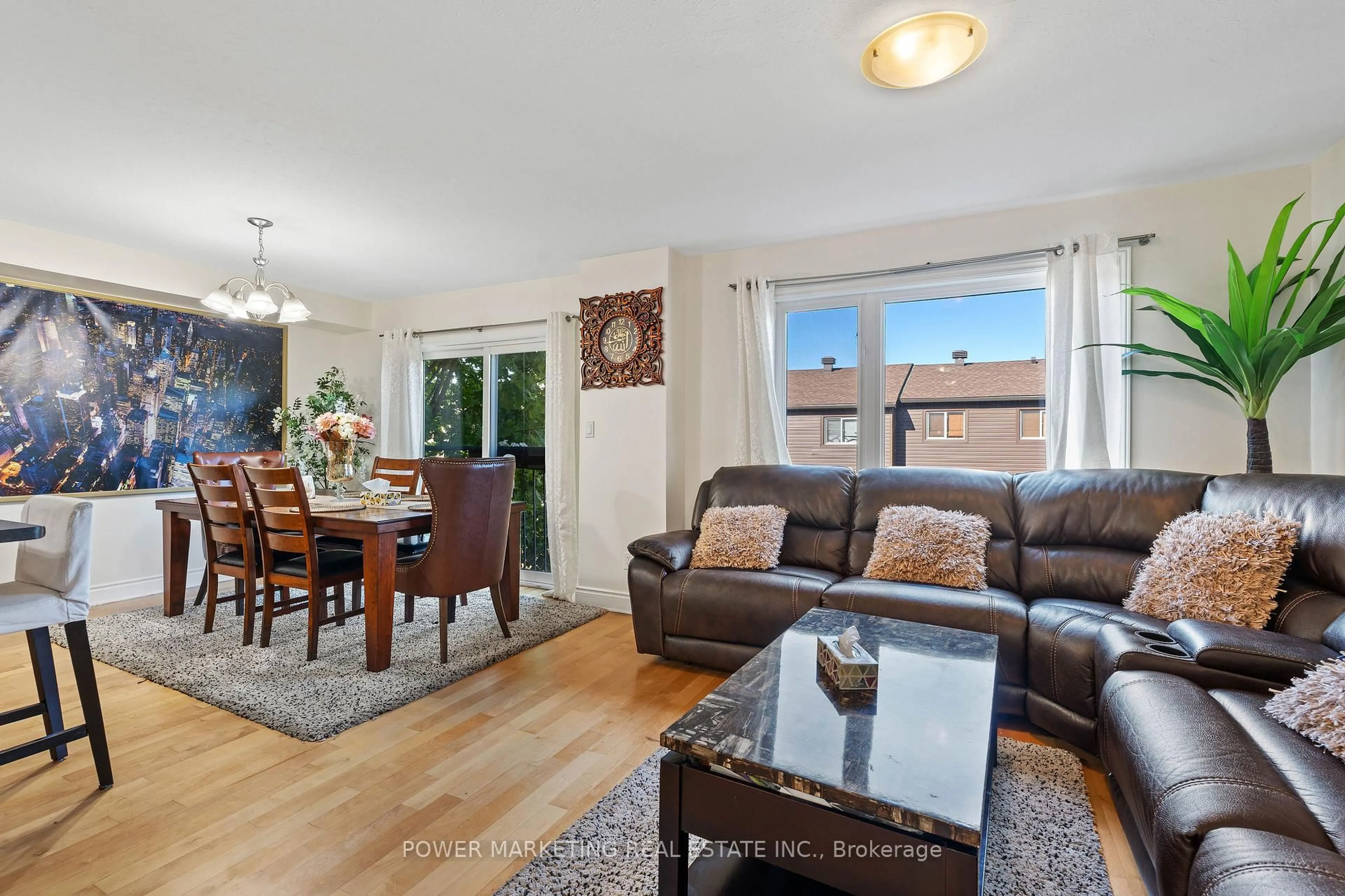 Living room with furniture, wood/laminate floor for 253 Parkin Circ, Ottawa Ontario K1T 4H7