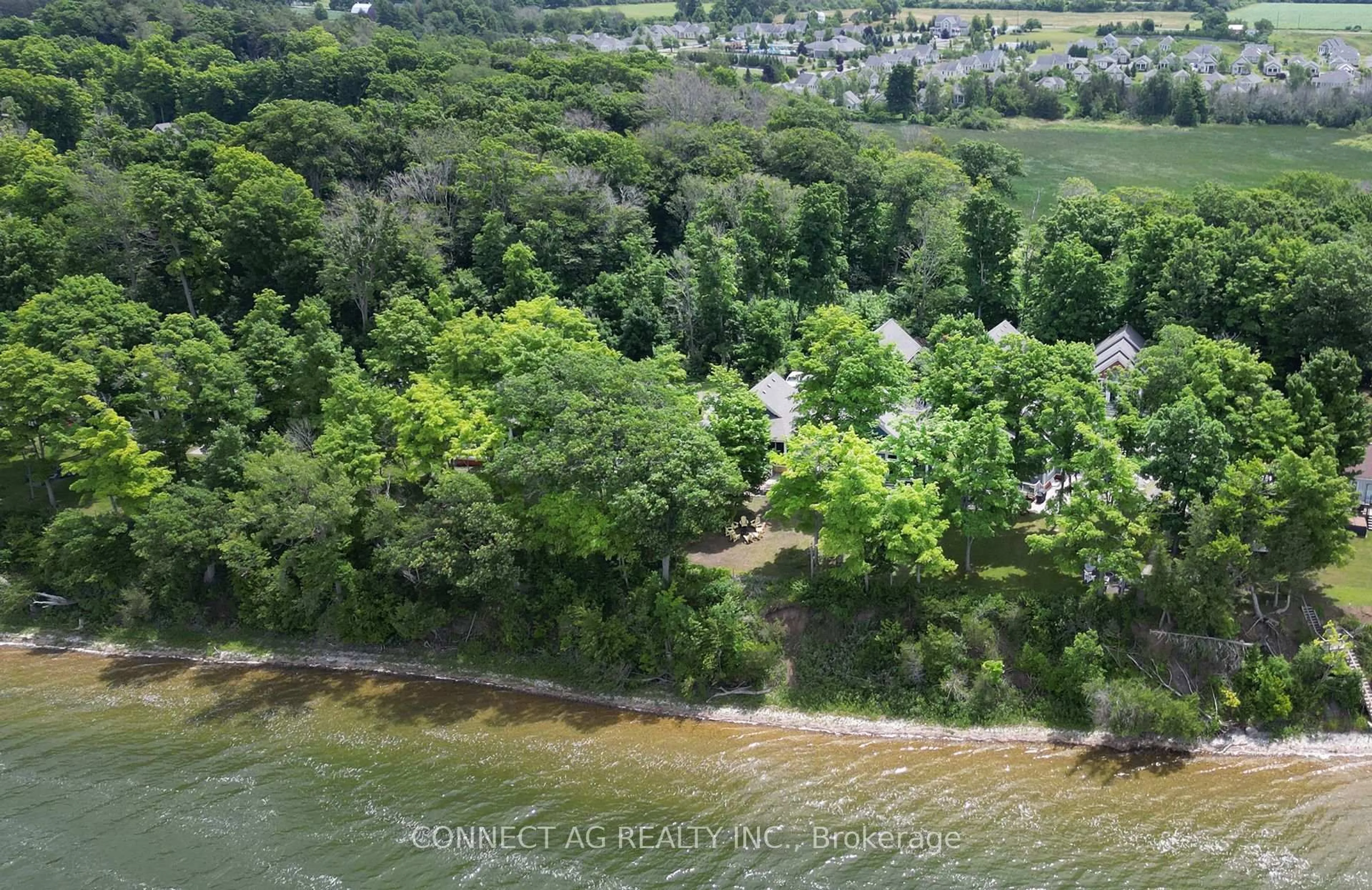 A pic from outside/outdoor area/front of a property/back of a property/a pic from drone, water/lake/river/ocean view for 44 Summer Village Lane #236, Prince Edward County Ontario K0K 1P0