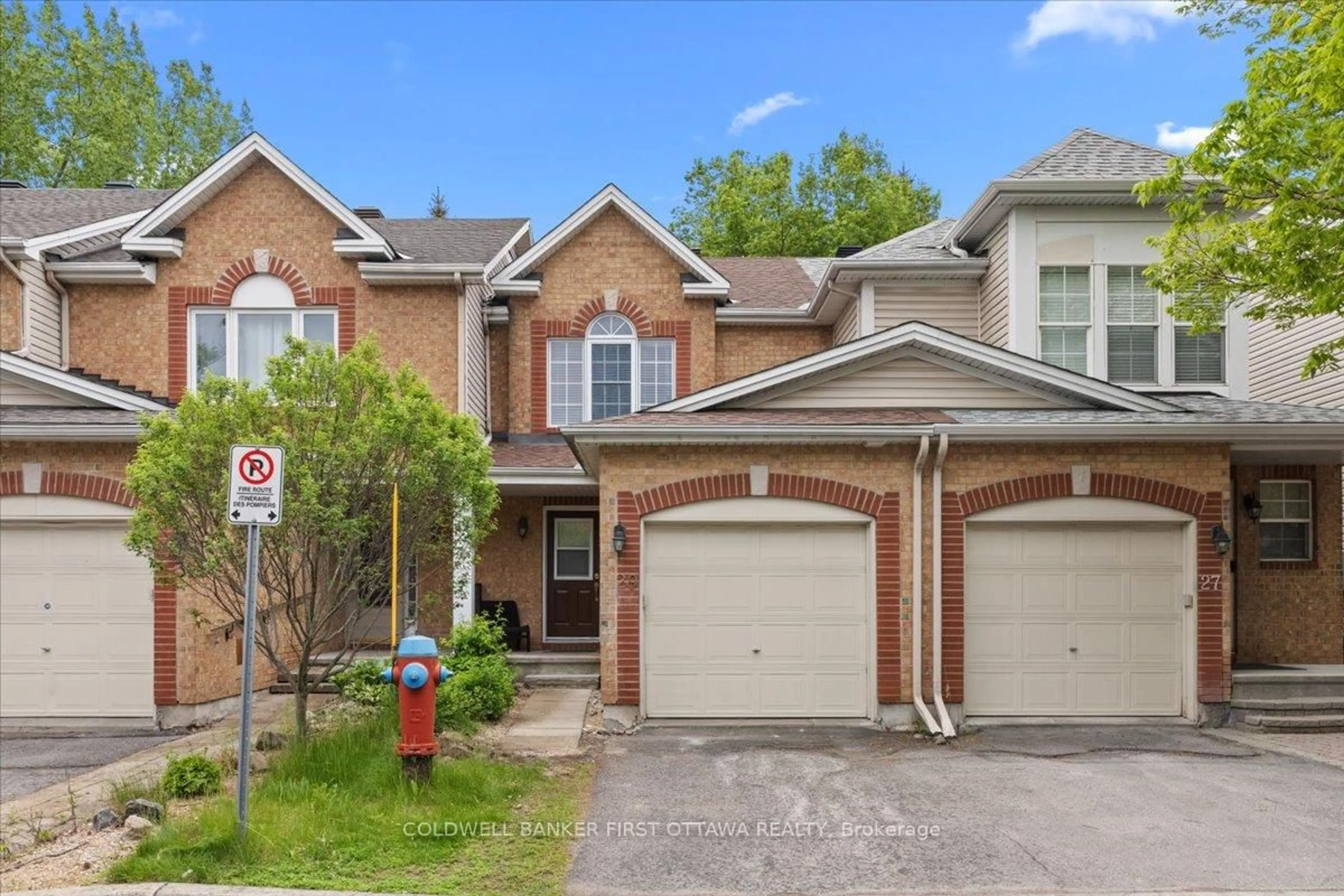 Home with brick exterior material, street for 29 HEARTLEAF Private, Ottawa Ontario K1T 3Z9