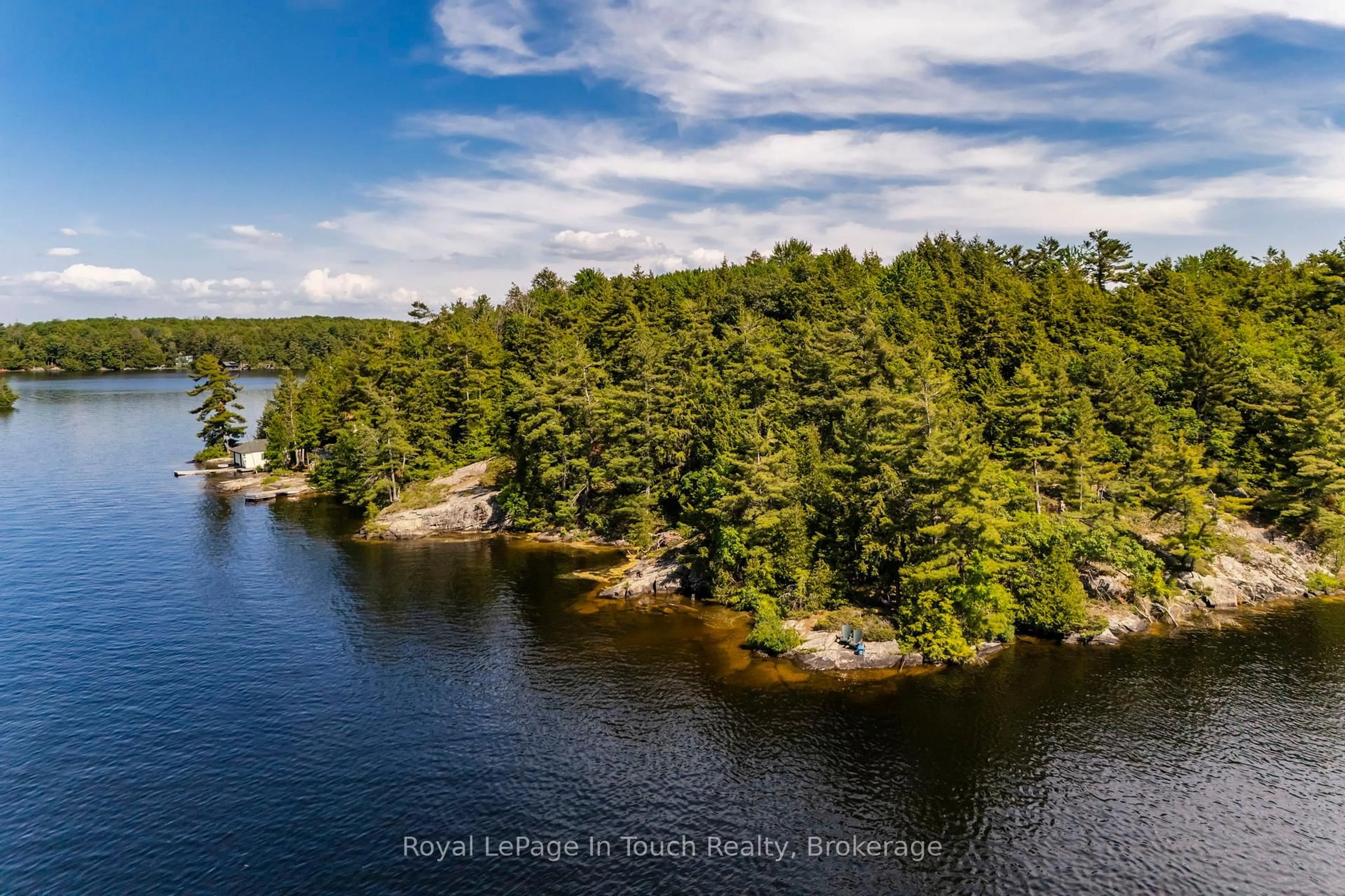 A pic from outside/outdoor area/front of a property/back of a property/a pic from drone, water/lake/river/ocean view for 2 Is 270 Six Mile Lake Island, Georgian Bay Ontario L0K 1S0