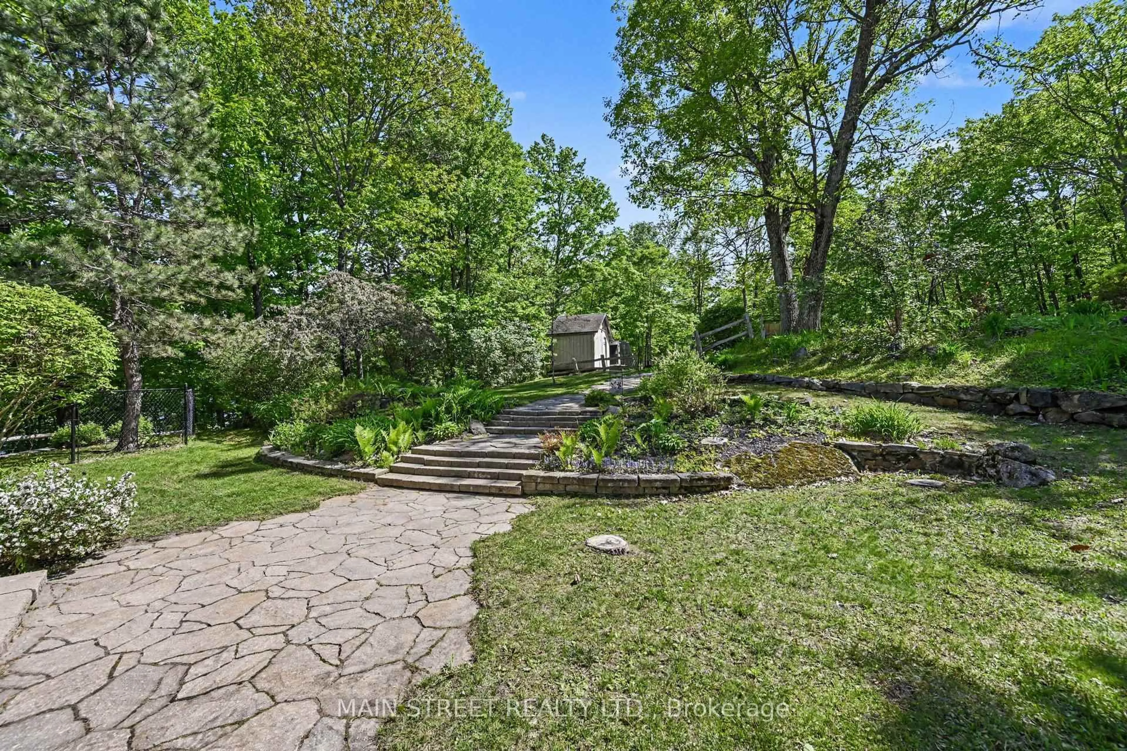 A pic from outside/outdoor area/front of a property/back of a property/a pic from drone, street for 100 Rainbow Lane, Maberly Ontario K0H 2B0