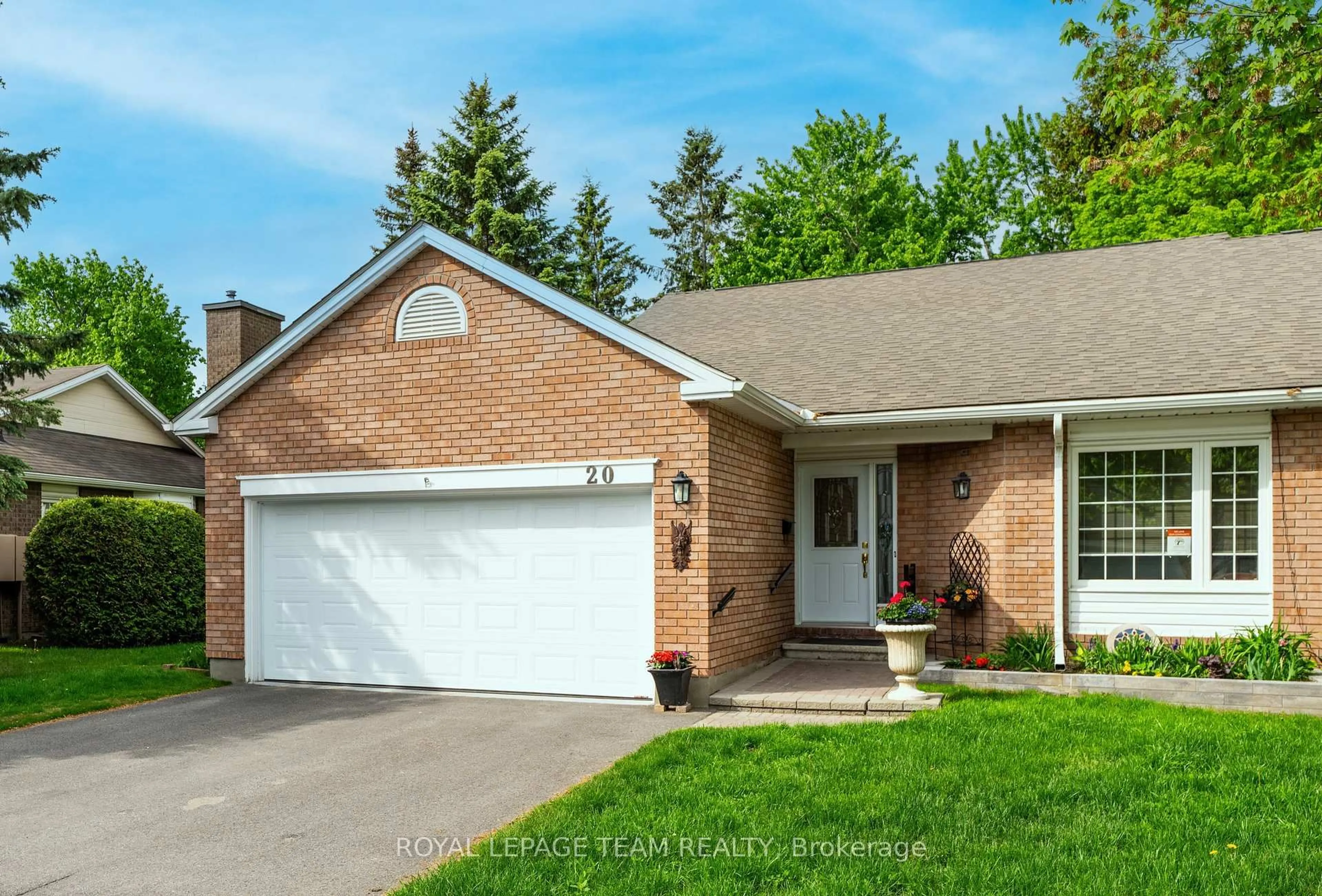 Home with brick exterior material, street for 20 Grand Harbour Crt #30, Stittsville Ontario K2S 1H2