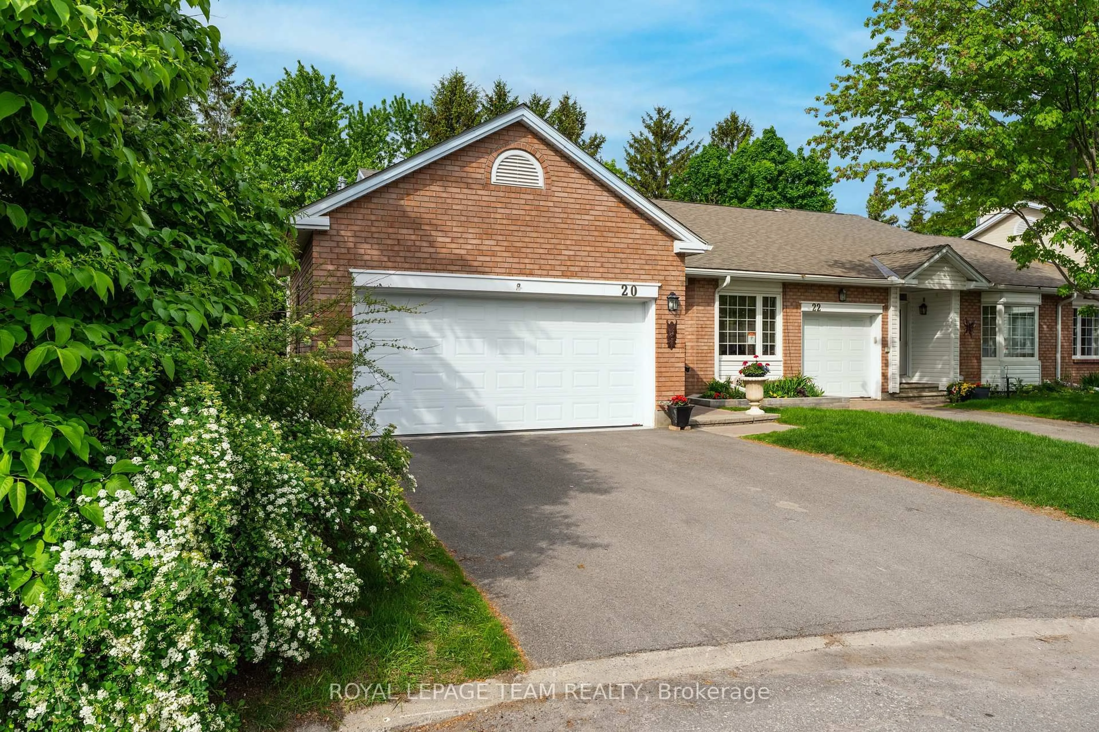 Home with brick exterior material, street for 20 Grand Harbour Crt #30, Stittsville Ontario K2S 1H2