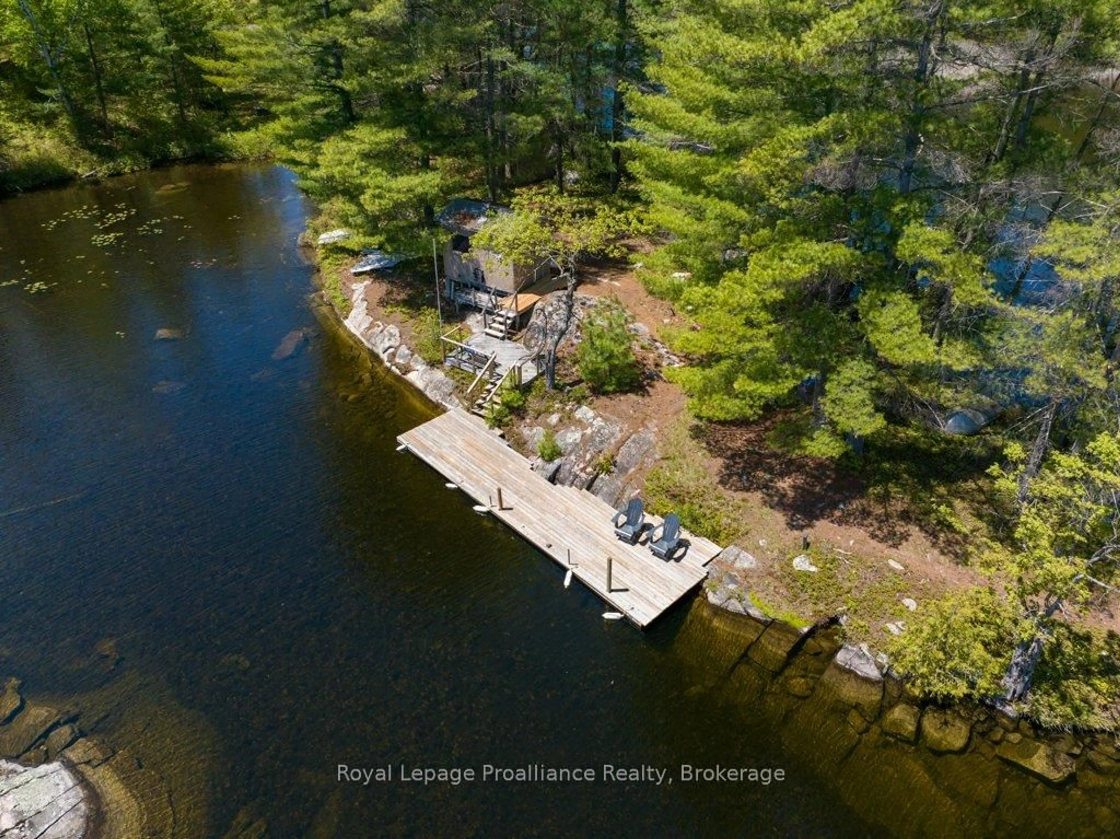 A pic from outside/outdoor area/front of a property/back of a property/a pic from drone, water/lake/river/ocean view for 1174 Marsh View Dr, Cloyne Ontario K0H 1K0