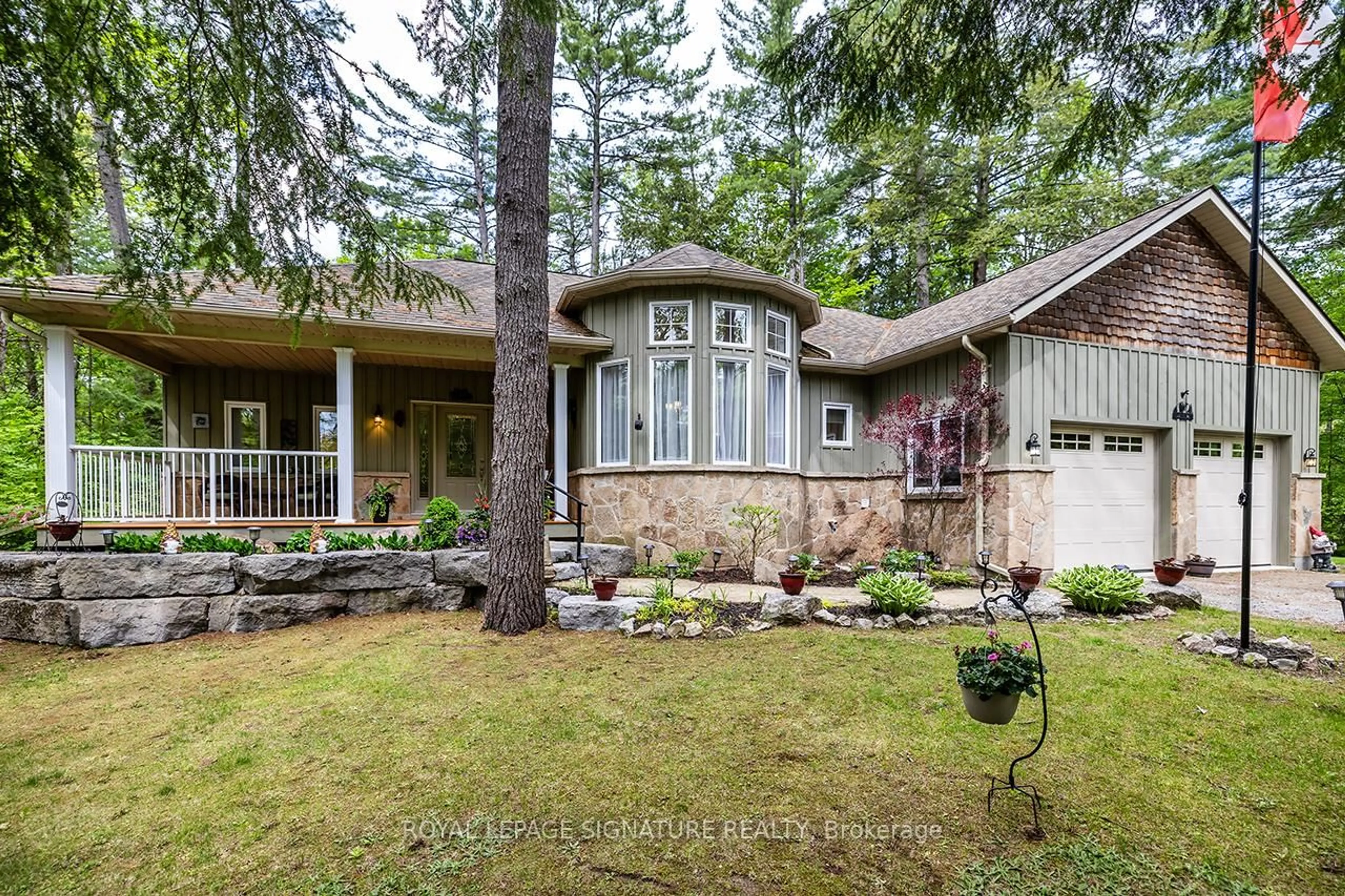 Home with vinyl exterior material, forest/trees view for 66 Melody Bay Rd, Trent Lakes Ontario K0L 1J0
