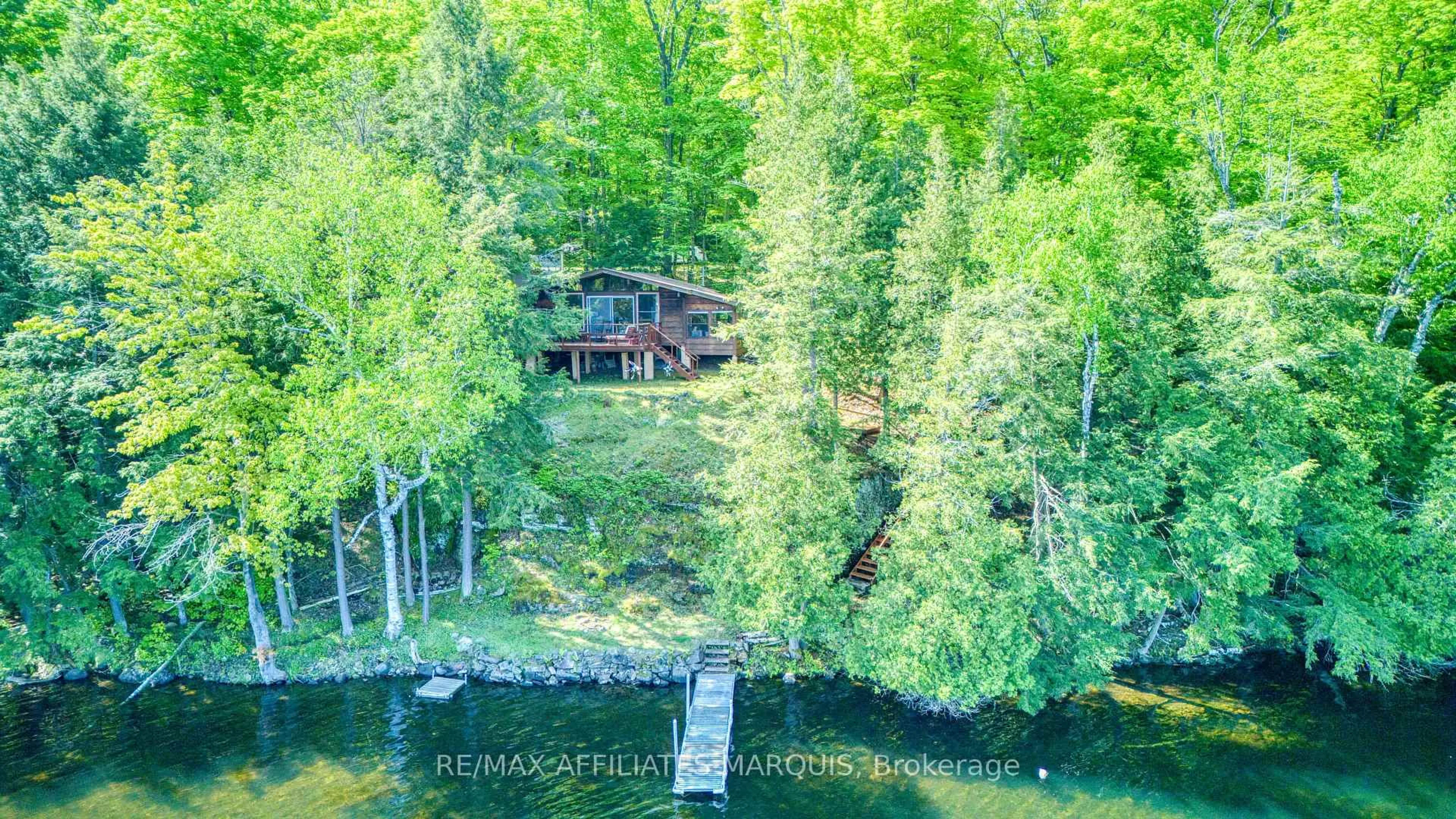A pic from outside/outdoor area/front of a property/back of a property/a pic from drone, water/lake/river/ocean view for 415 Yvon Lane, Rideau Lakes Ontario K0G 1X0