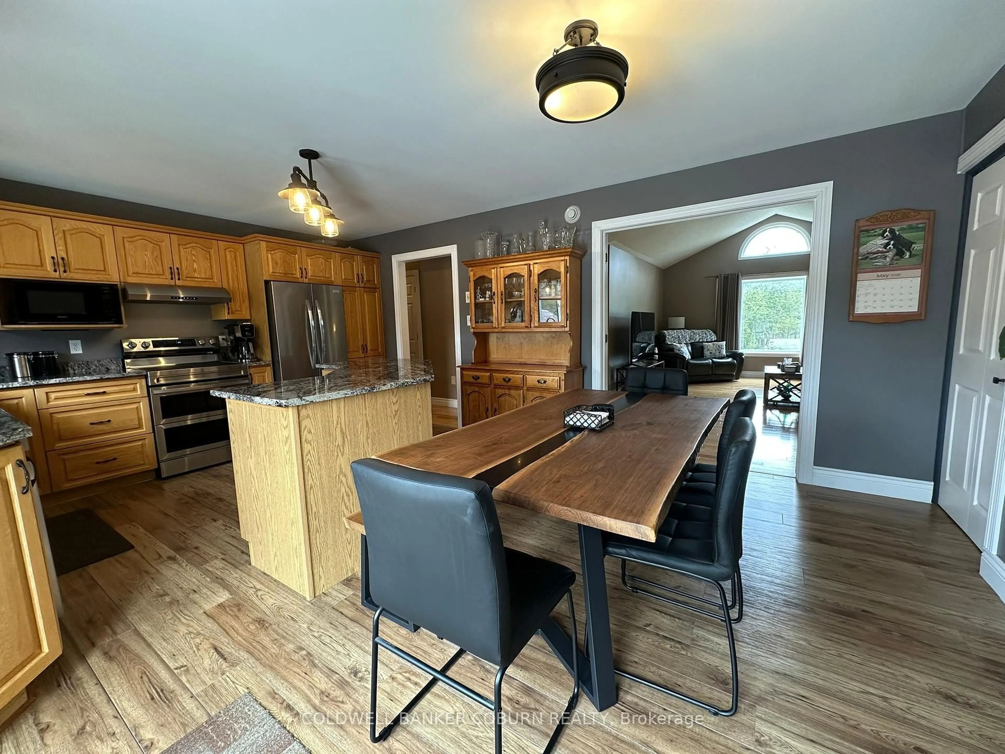 Open concept kitchen, wood/laminate floor for 2480 Beach Rd, North Grenville Ontario K0G 1T0