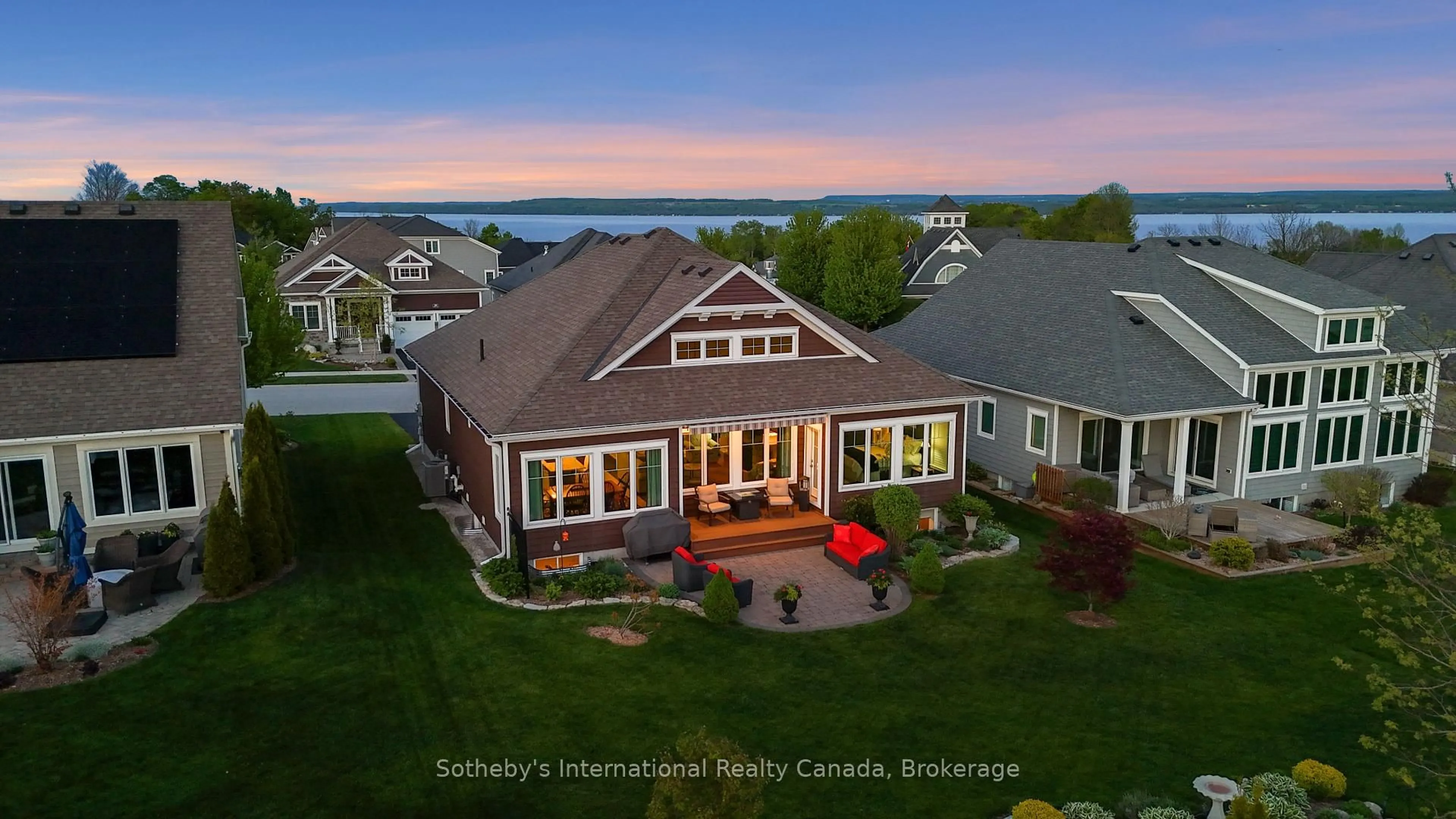 A pic from outside/outdoor area/front of a property/back of a property/a pic from drone, water/lake/river/ocean view for 208 Snowberry Lane, Georgian Bluffs Ontario N0H 1S0