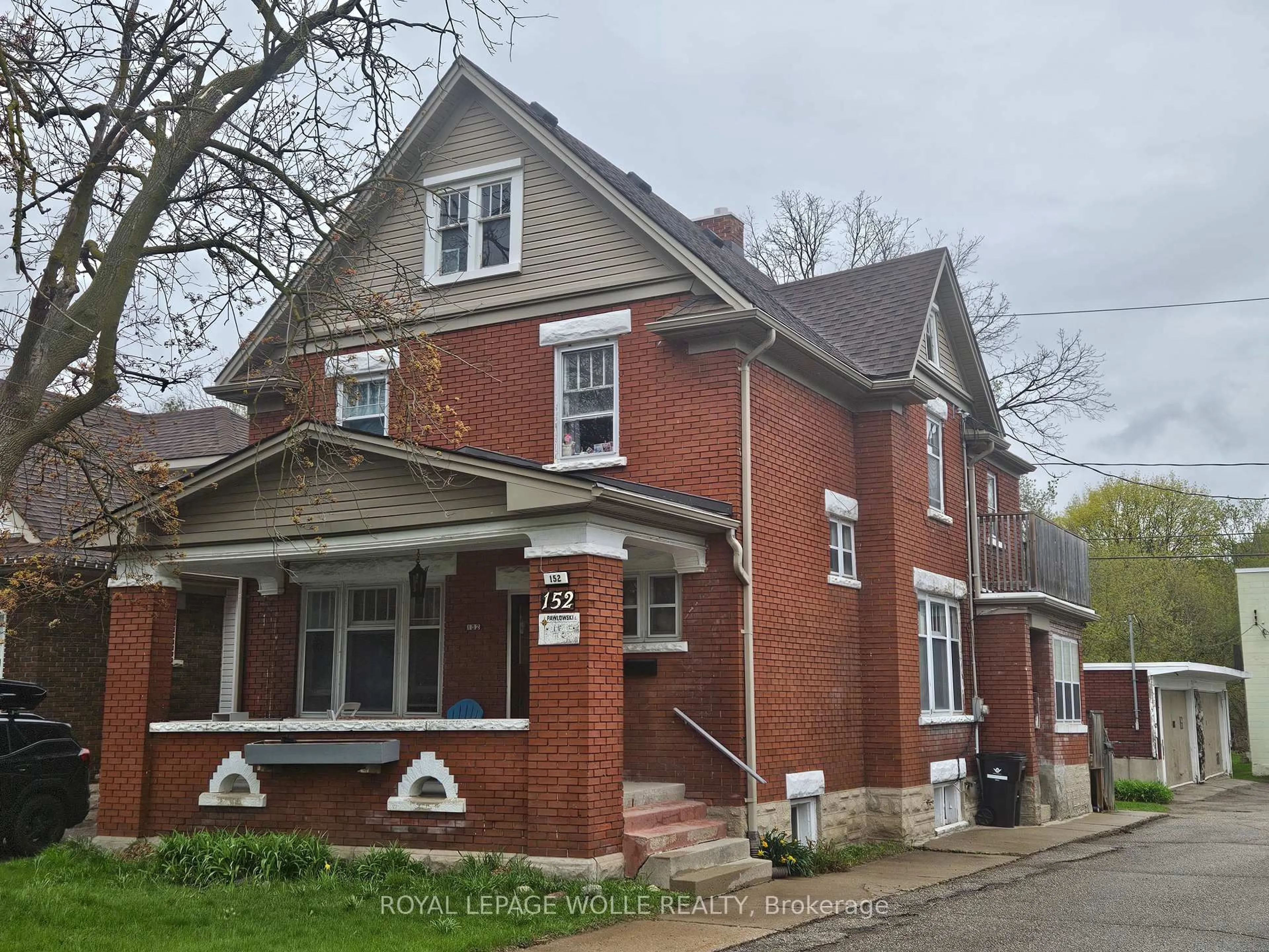 Home with brick exterior material, street for 152 Homewood Ave, Kitchener Ontario N2M 1W9