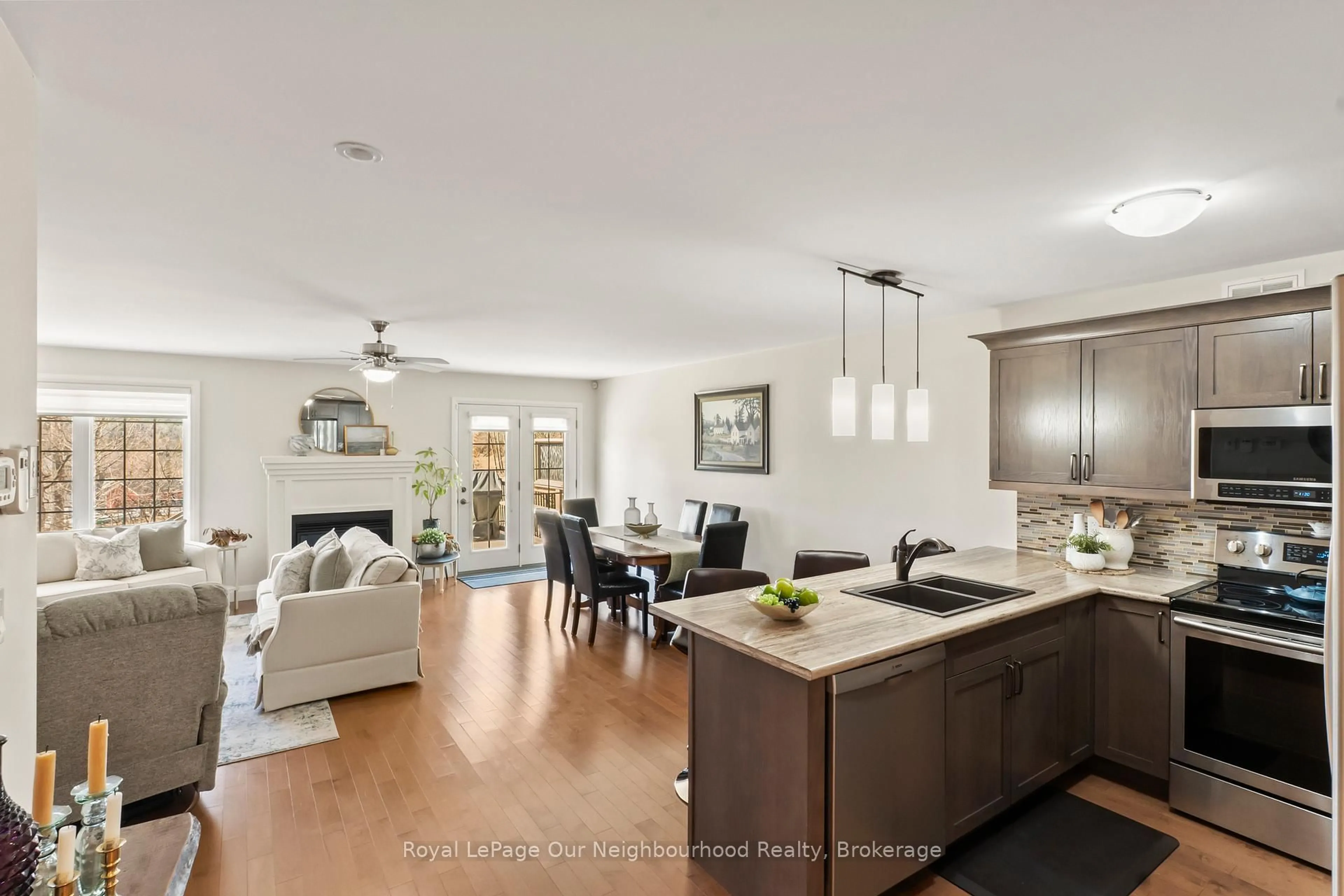 Open concept kitchen, wood/laminate floor for 61 Orchard Way, Trent Hills Ontario K0K 3K0