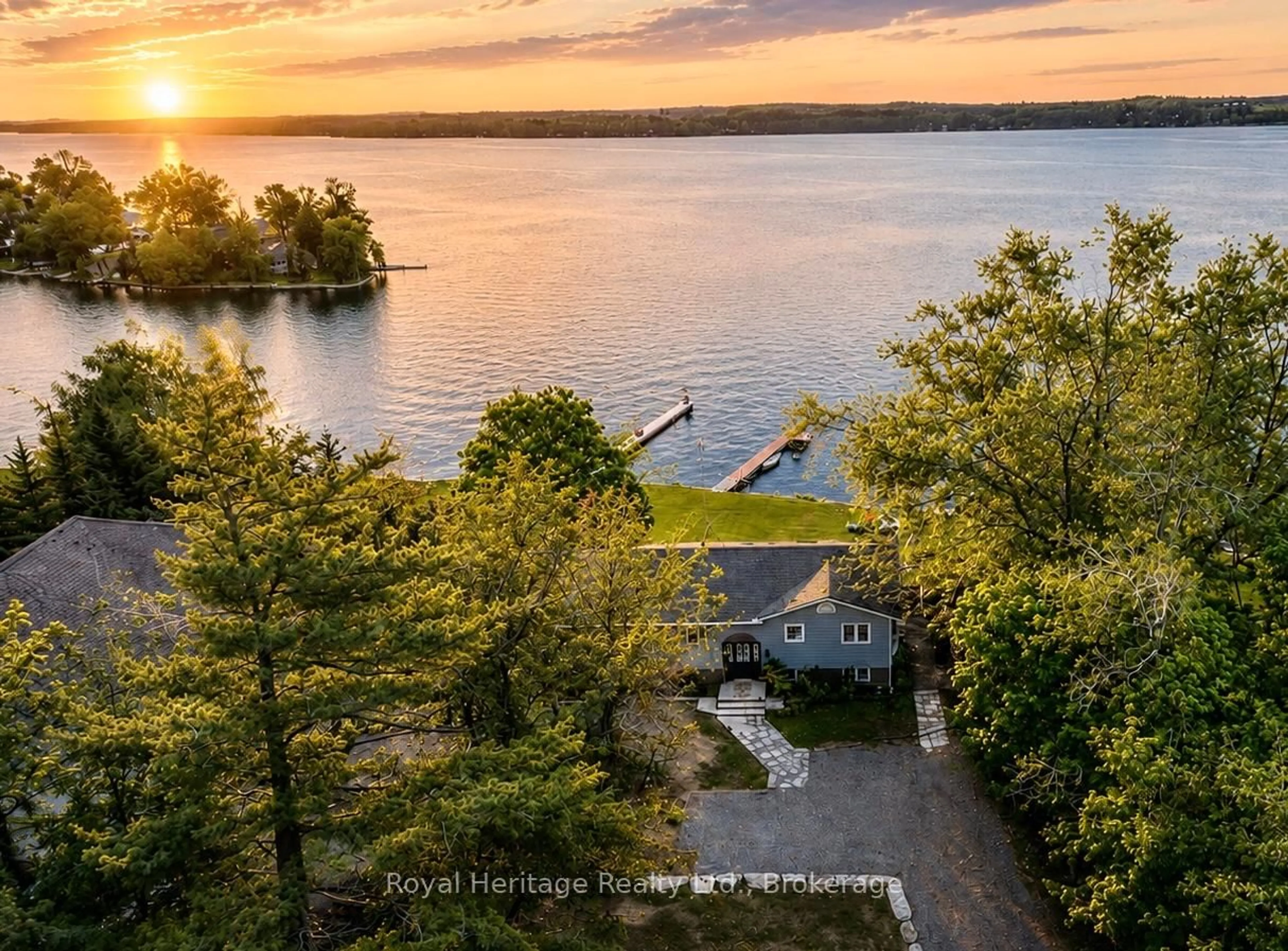 A pic from outside/outdoor area/front of a property/back of a property/a pic from drone, water/lake/river/ocean view for 62 Bettys Bay Rd, Kawartha Lakes Ontario K0M 1G0