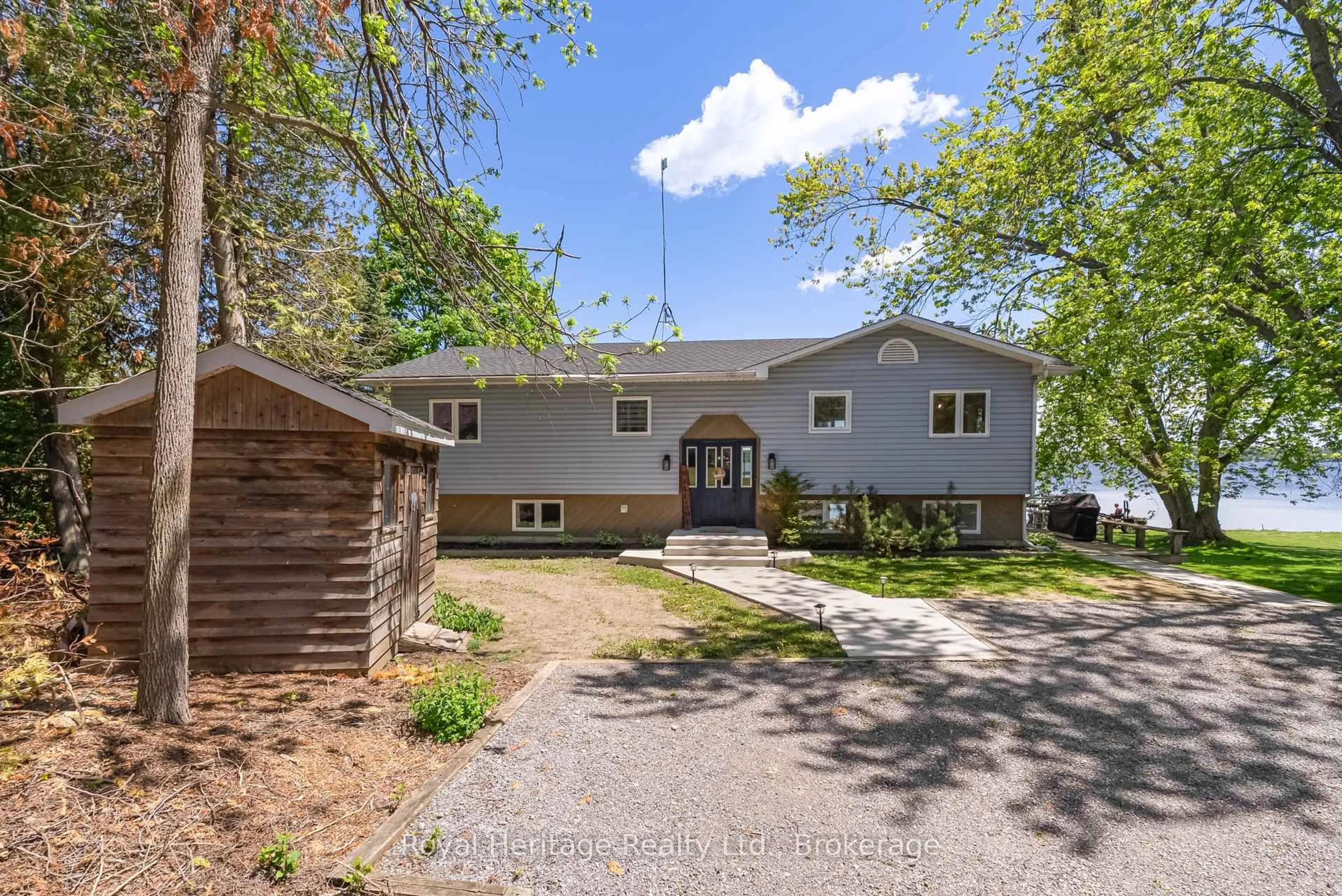 A pic from outside/outdoor area/front of a property/back of a property/a pic from drone, unknown for 62 Bettys Bay Rd, Kawartha Lakes Ontario K0M 1G0