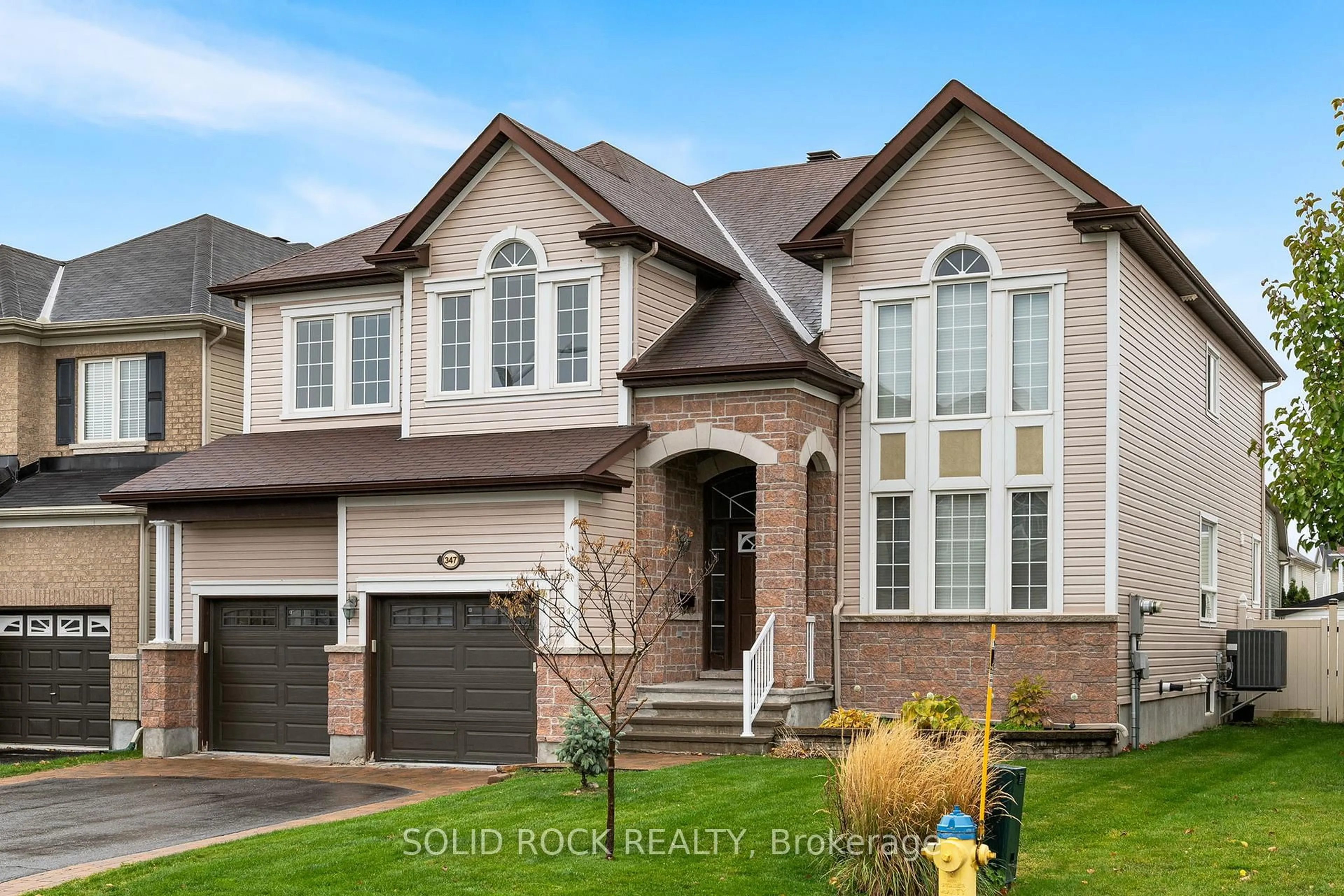 Home with brick exterior material, street for 347 Bamburgh Way, Ottawa Ontario K2J 5R1