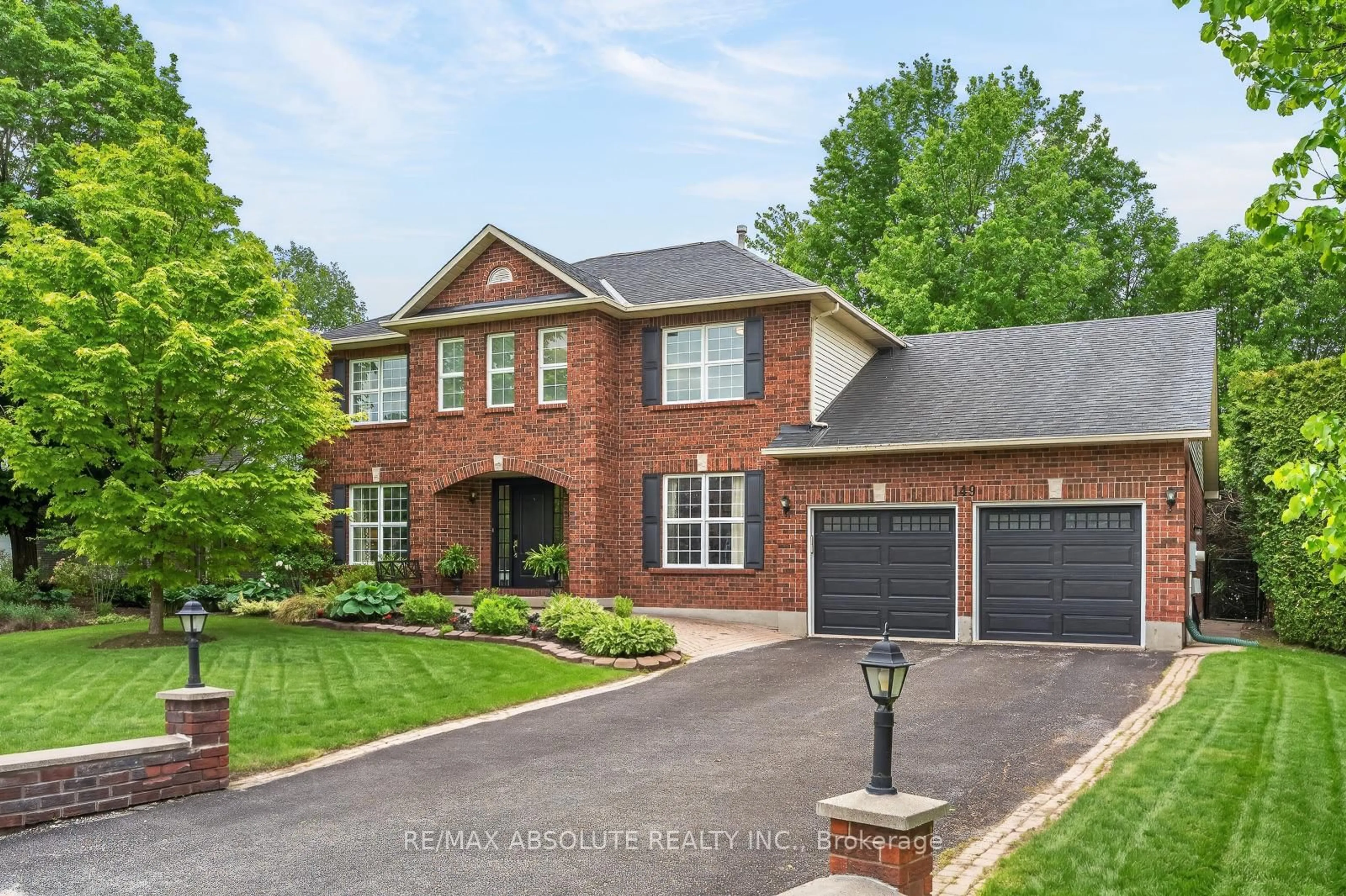Home with brick exterior material, street for 149 Lanigan Cres, Stittsville Ontario K2S 1G9