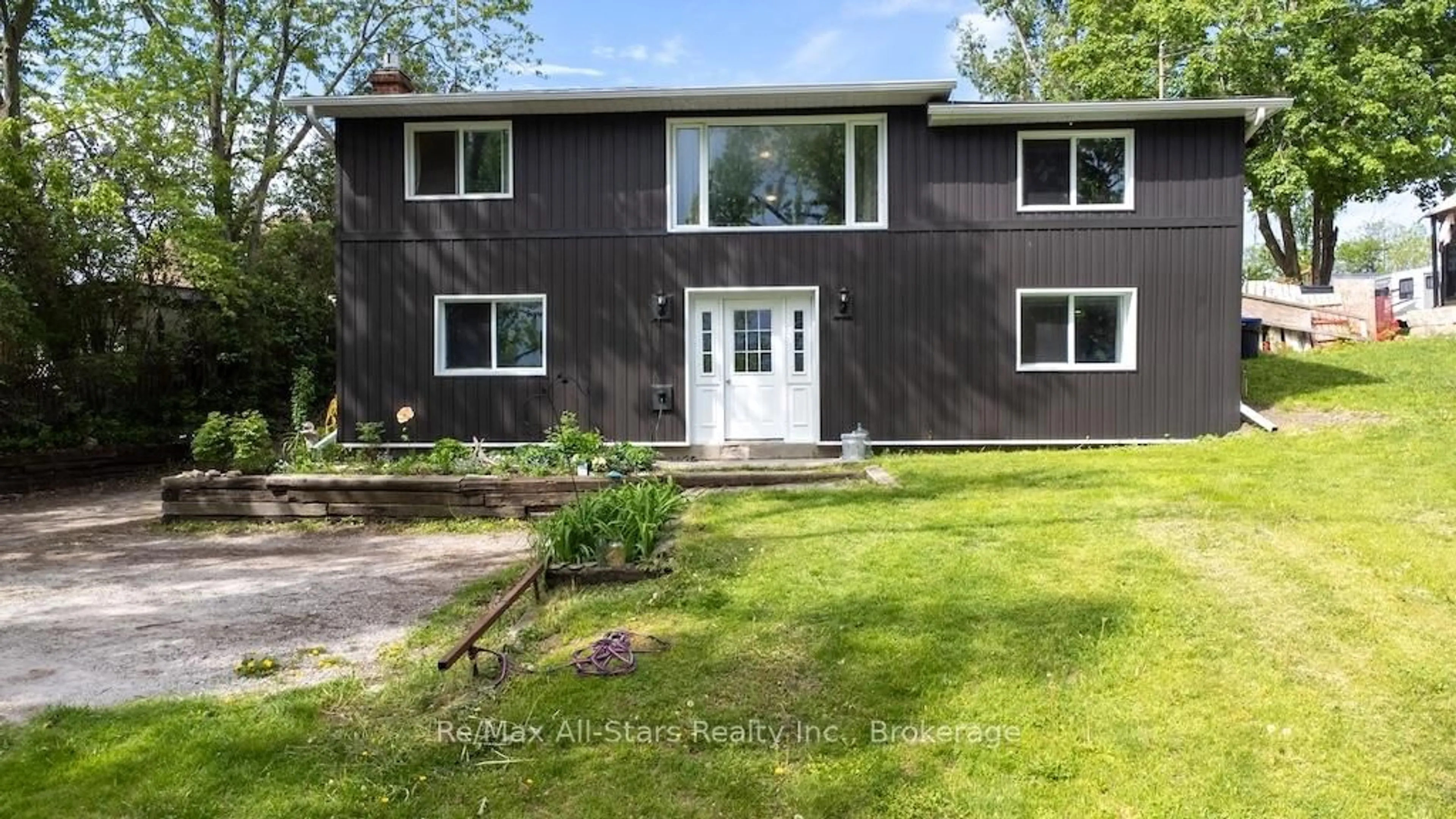 Home with vinyl exterior material, street for 9 Riverside Dr Dr, Kawartha Lakes Ontario K9V 0H6