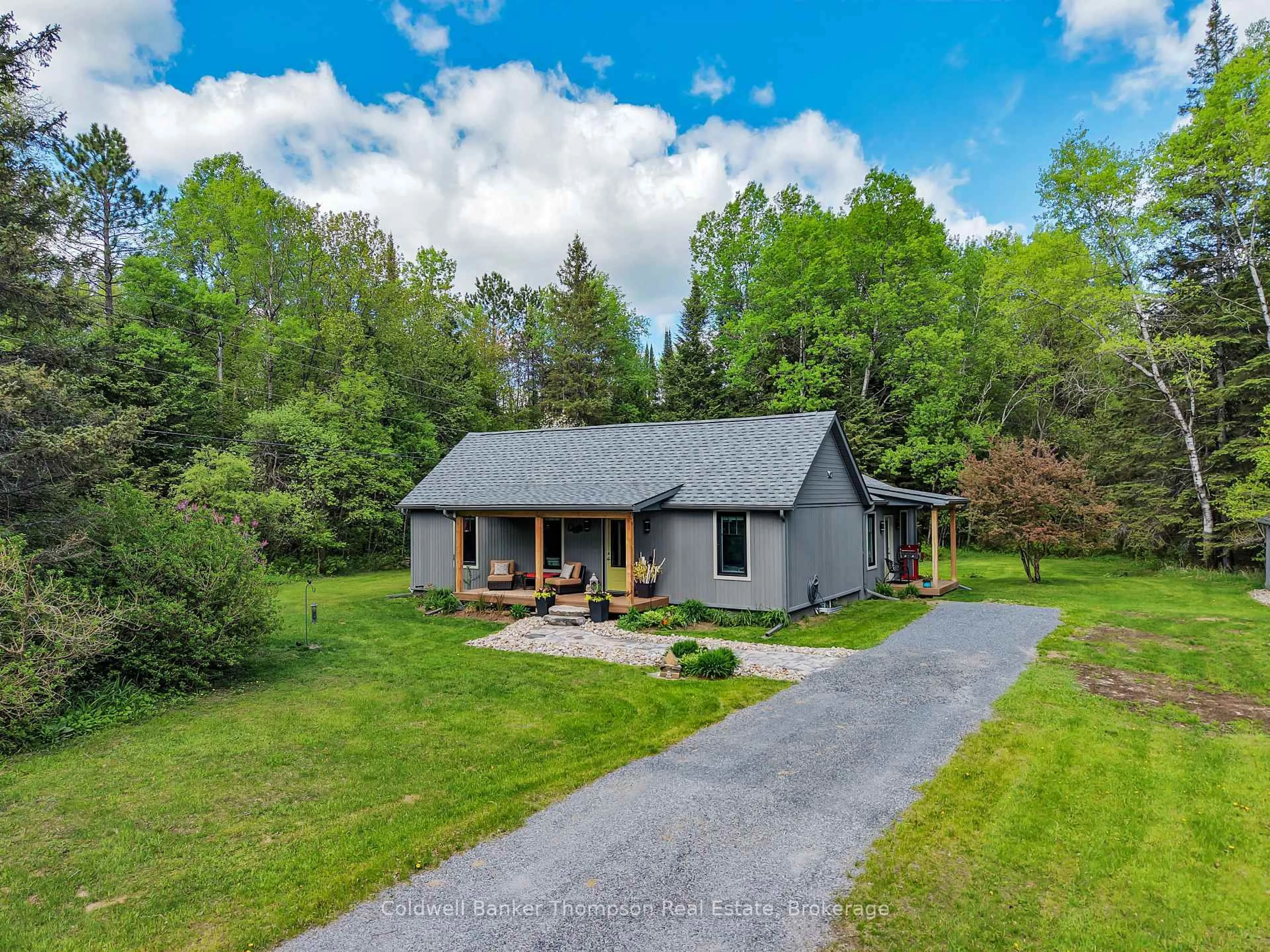 A pic from outside/outdoor area/front of a property/back of a property/a pic from drone, unknown for 247 OLD NORTH Rd, Huntsville Ontario P1H 2J4