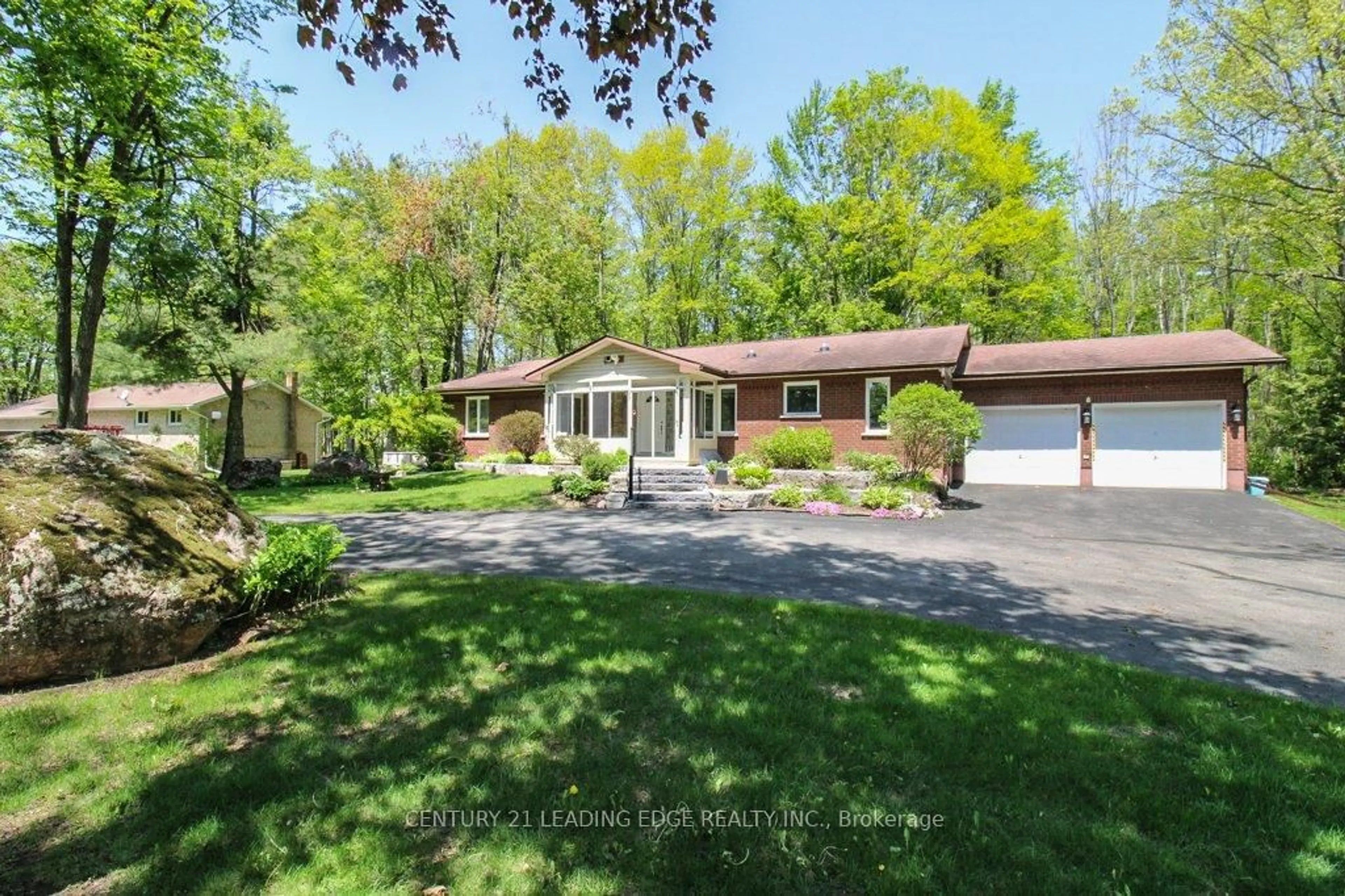 A pic from outside/outdoor area/front of a property/back of a property/a pic from drone, street for 166 Adam And Eve Rd, Trent Lakes Ontario K0L 1J0