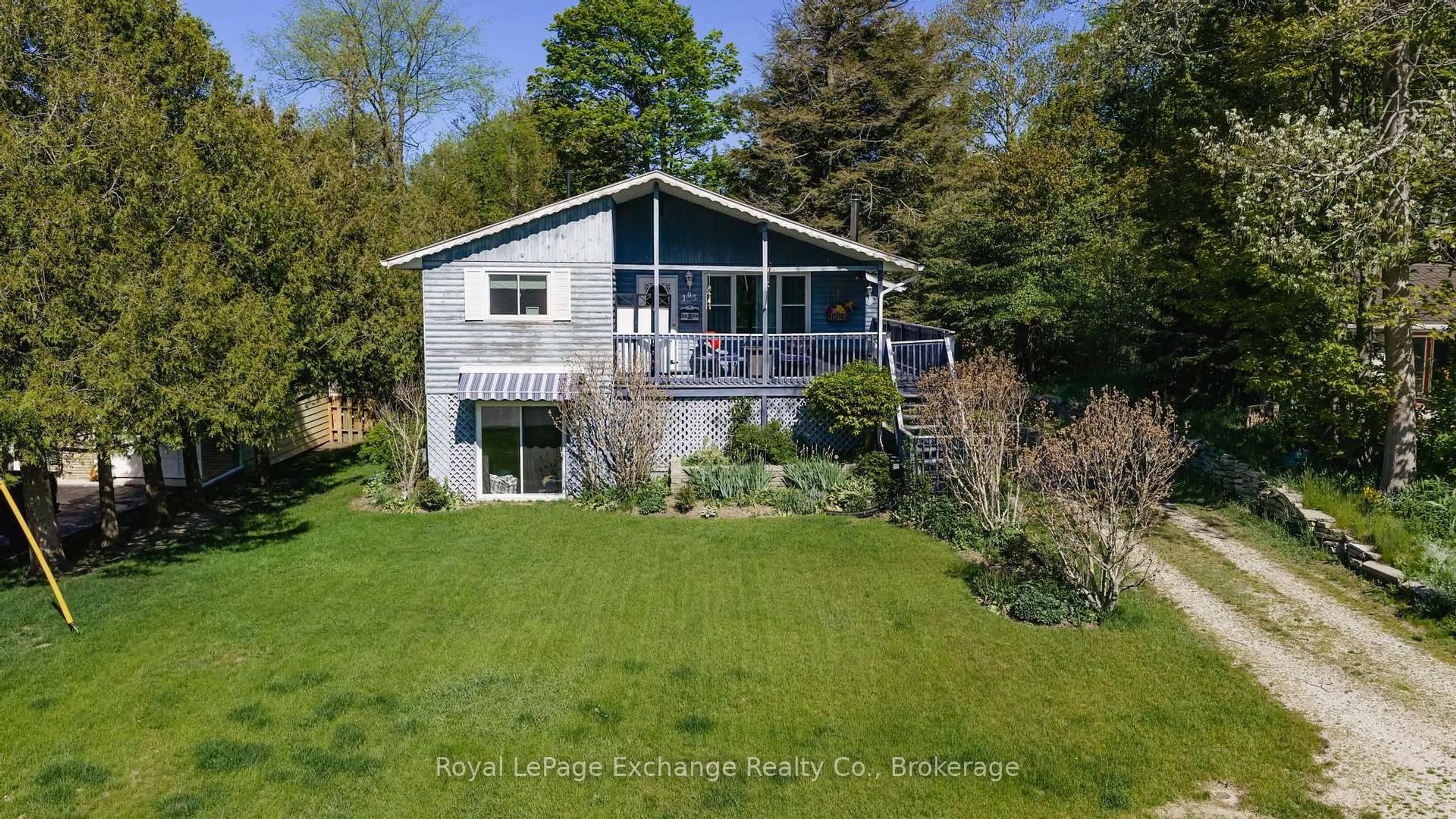 A pic from outside/outdoor area/front of a property/back of a property/a pic from drone, water/lake/river/ocean view for 105 Menomini Rd, Huron-Kinloss Ontario N2Z 2X3