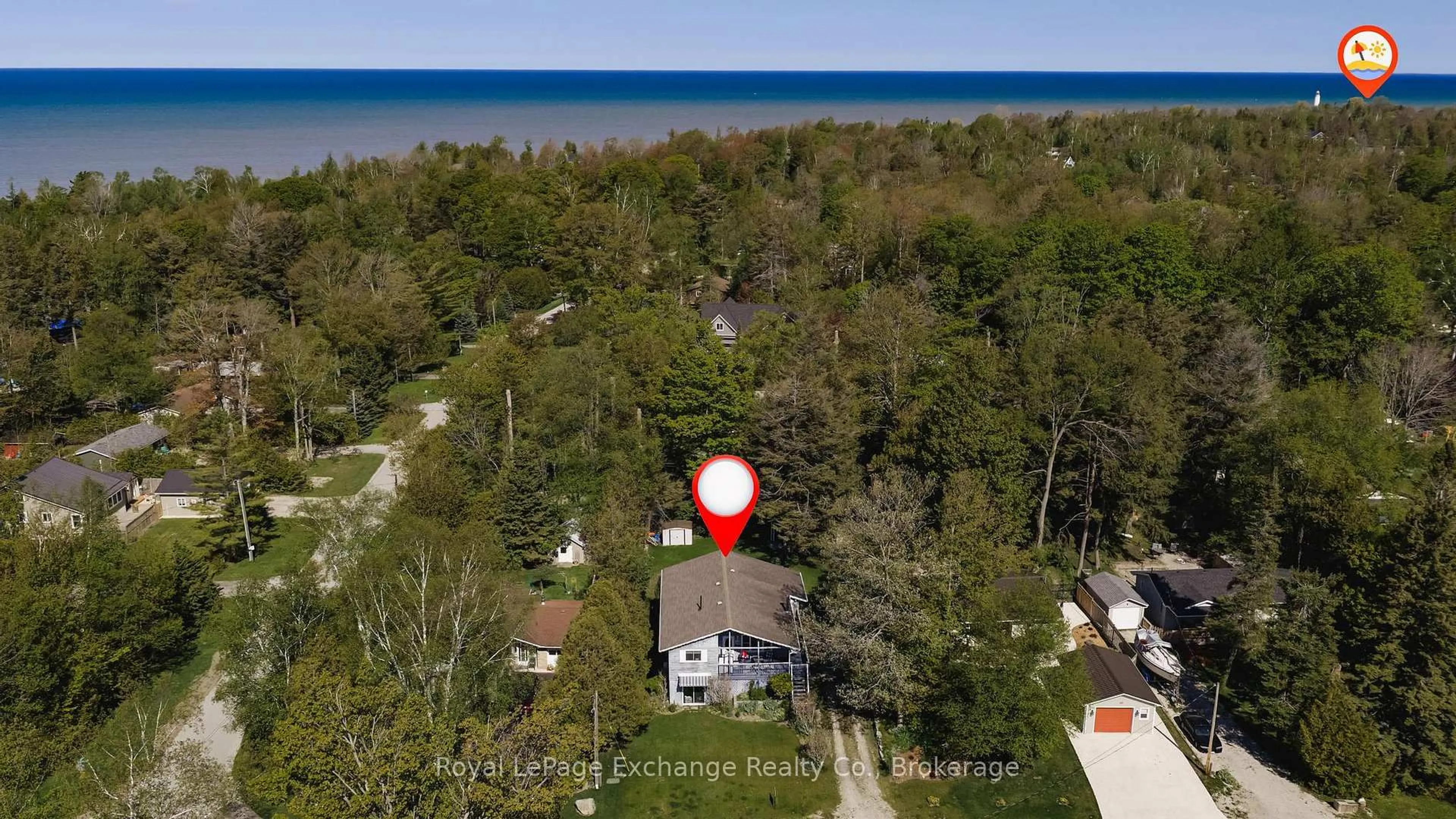 A pic from outside/outdoor area/front of a property/back of a property/a pic from drone, water/lake/river/ocean view for 105 Menomini Rd, Huron-Kinloss Ontario N2Z 2X3