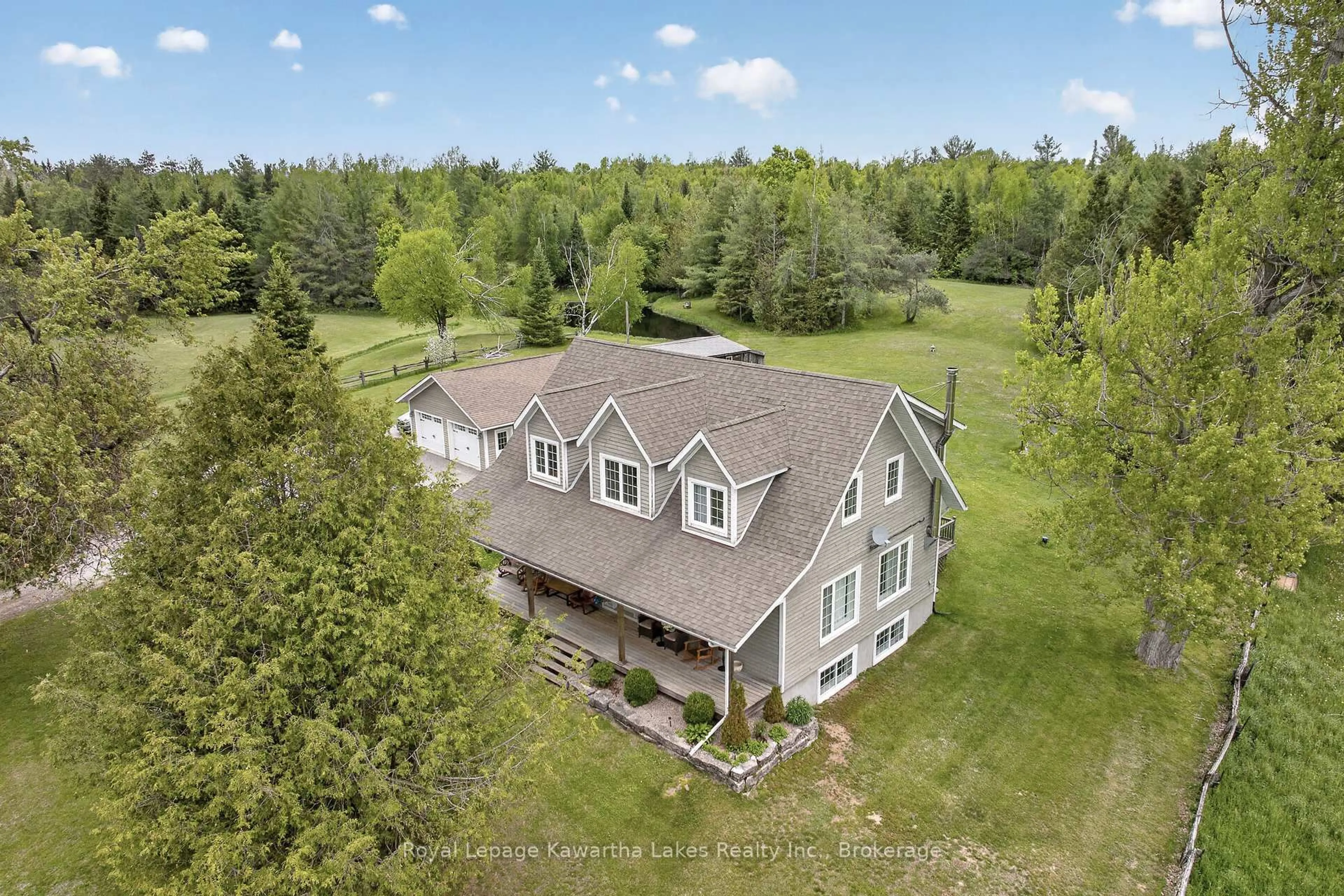 A pic from outside/outdoor area/front of a property/back of a property/a pic from drone, unknown for 3580 County Road 121, Trent Lakes Ontario K0M 2A0