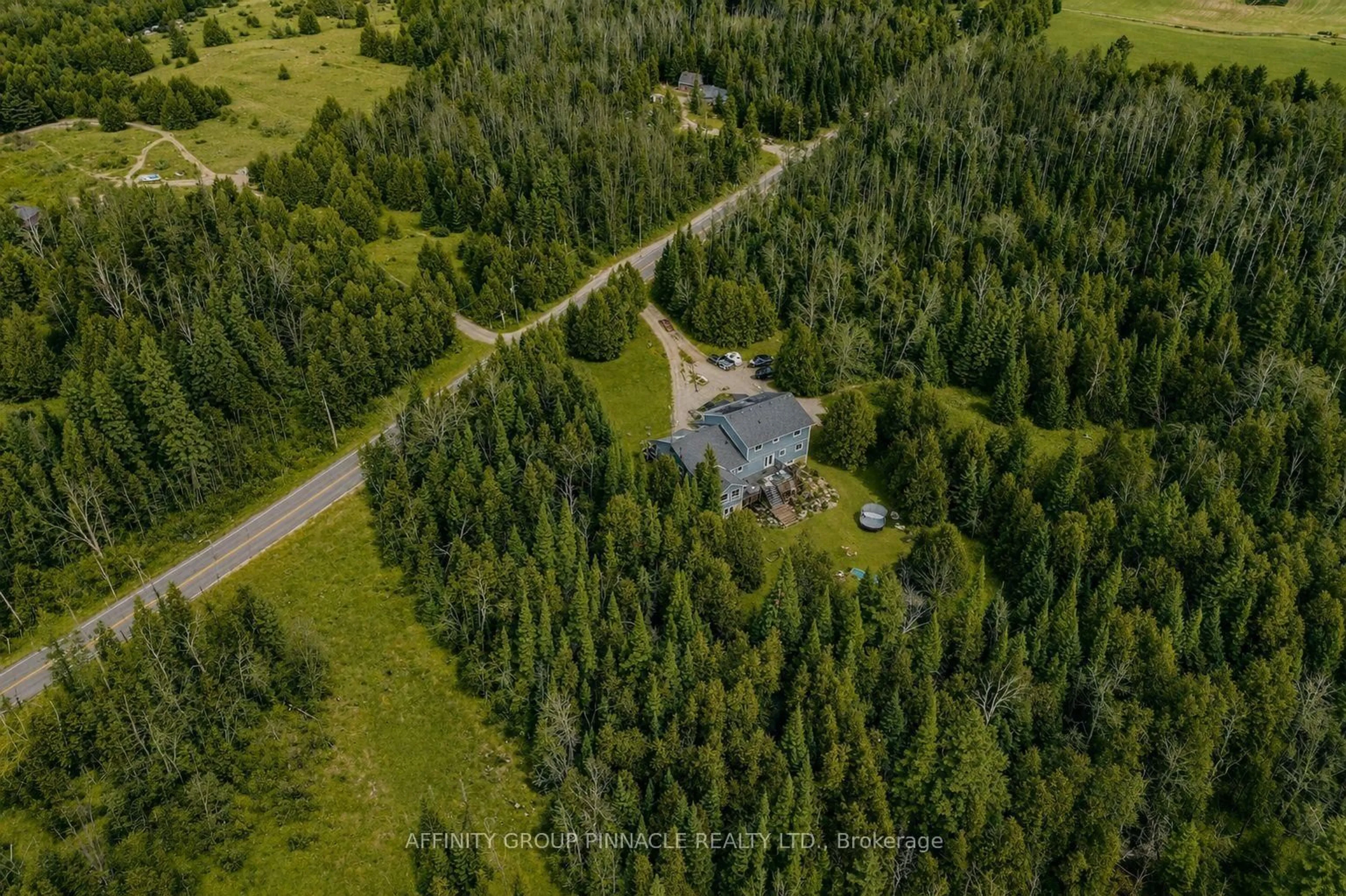 A pic from outside/outdoor area/front of a property/back of a property/a pic from drone, forest/trees view for 196 Bury's Green Rd, Kawartha Lakes Ontario K0M 1N0