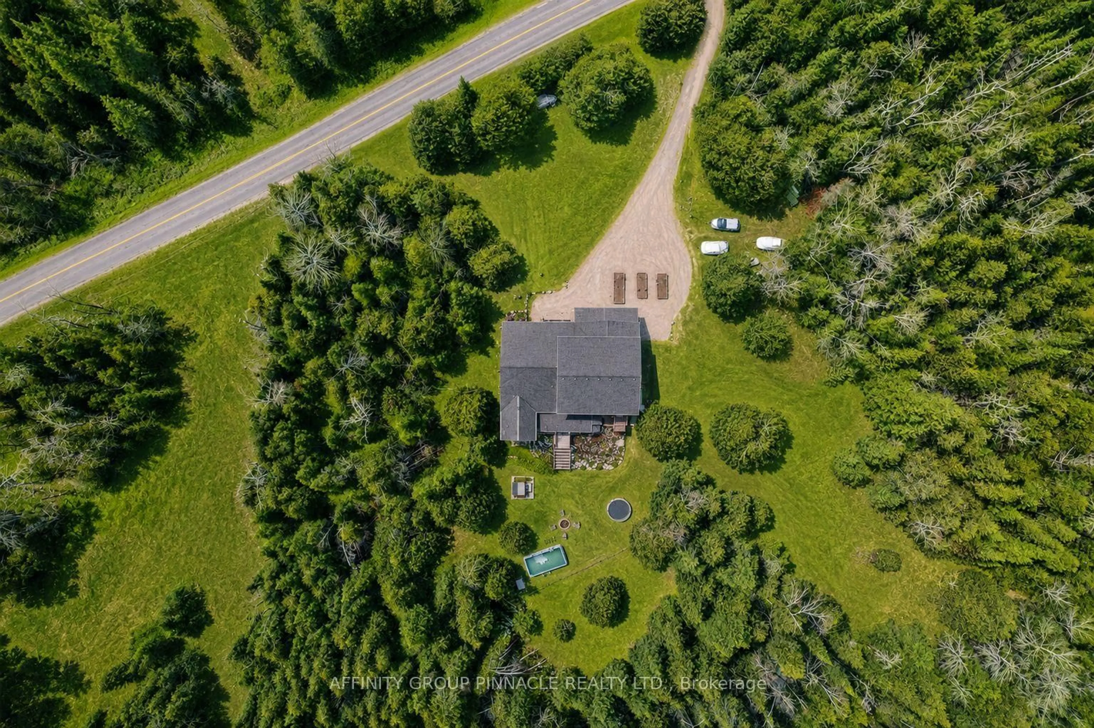 A pic from outside/outdoor area/front of a property/back of a property/a pic from drone, forest/trees view for 196 Bury's Green Rd, Kawartha Lakes Ontario K0M 1N0