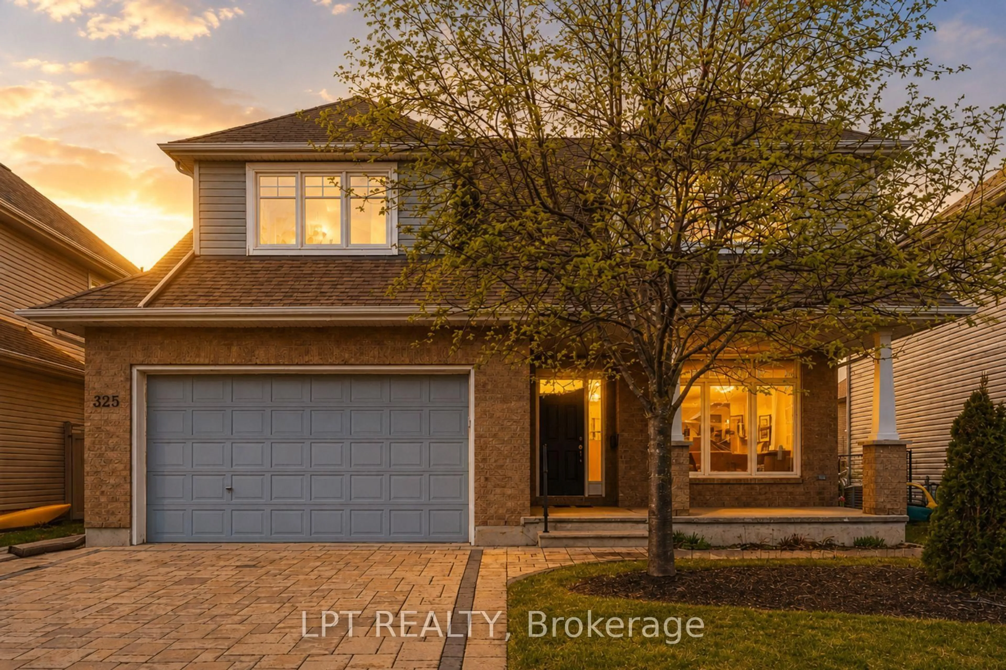 Home with brick exterior material, street for 325 Creston Valley Way, Ottawa Ontario K1T 0G6