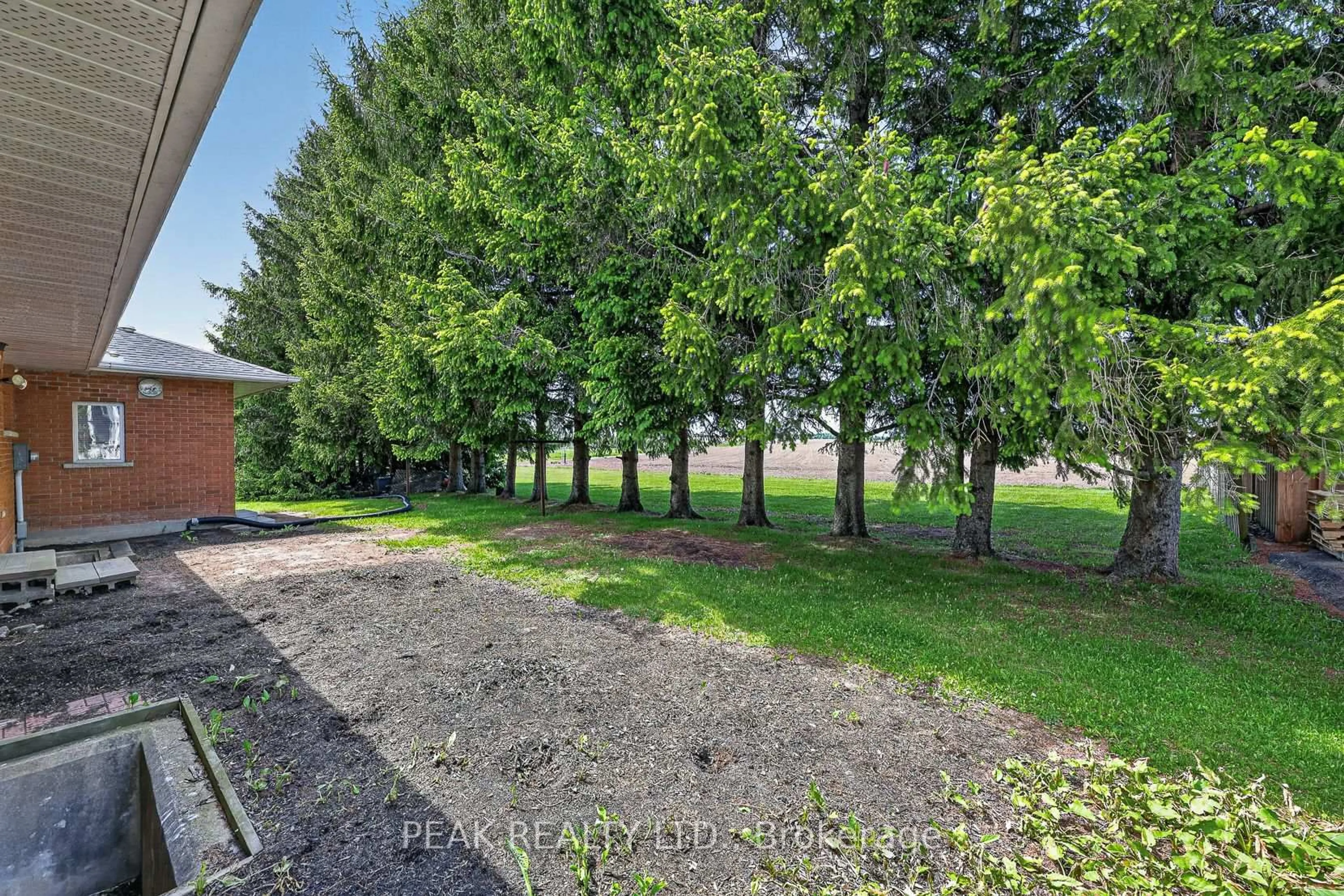 A pic from outside/outdoor area/front of a property/back of a property/a pic from drone, forest/trees view for 190 Snyder's Rd, Wilmot Ontario N3A 2L9
