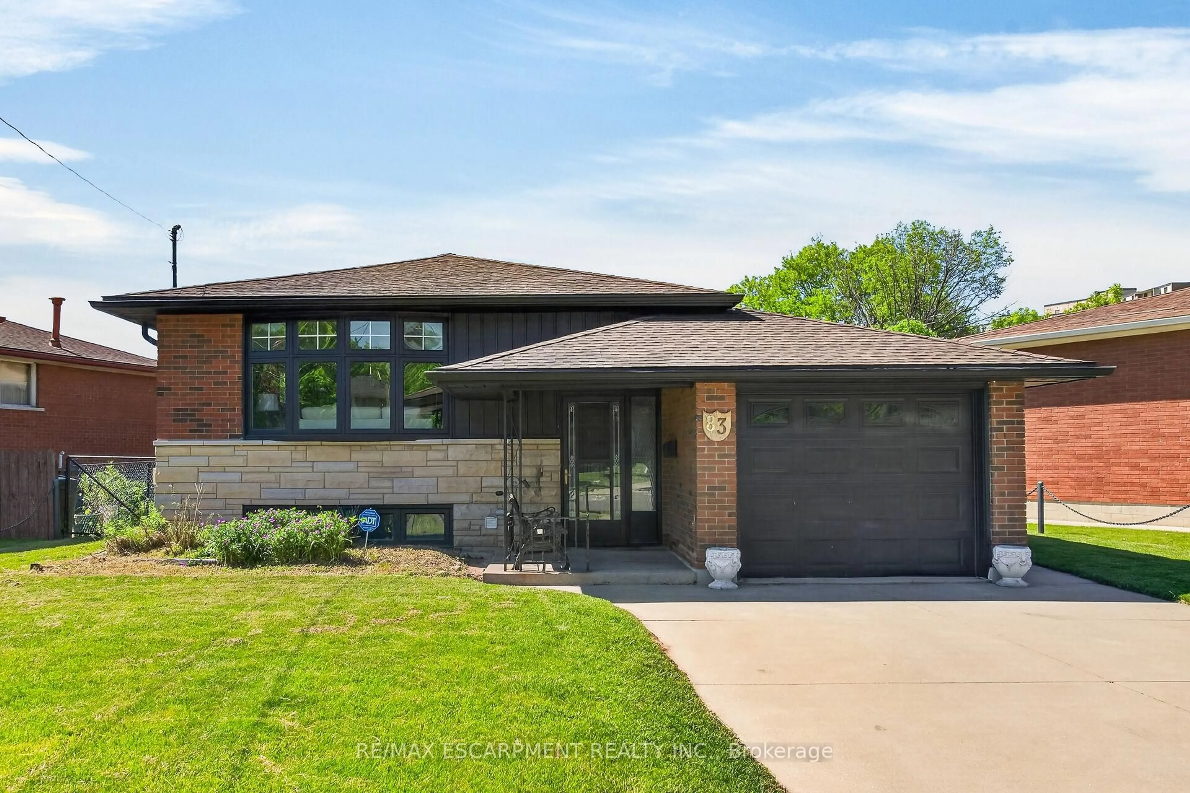 Home with brick exterior material, street for 83 Riverdale Dr, Hamilton Ontario L8E 1K2