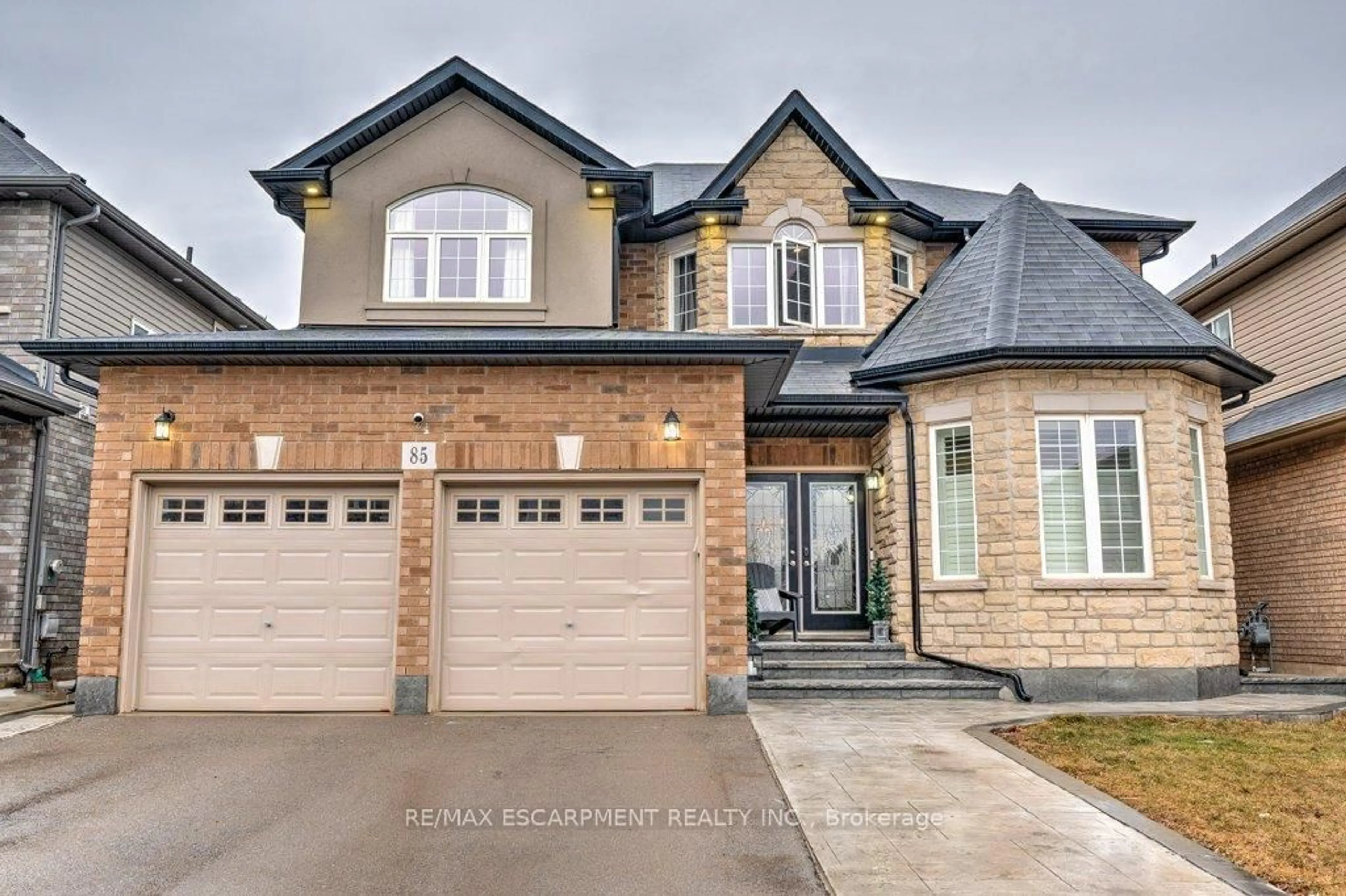 Home with brick exterior material, street for 85 Showcase Dr, Hamilton Ontario L0R 1P0