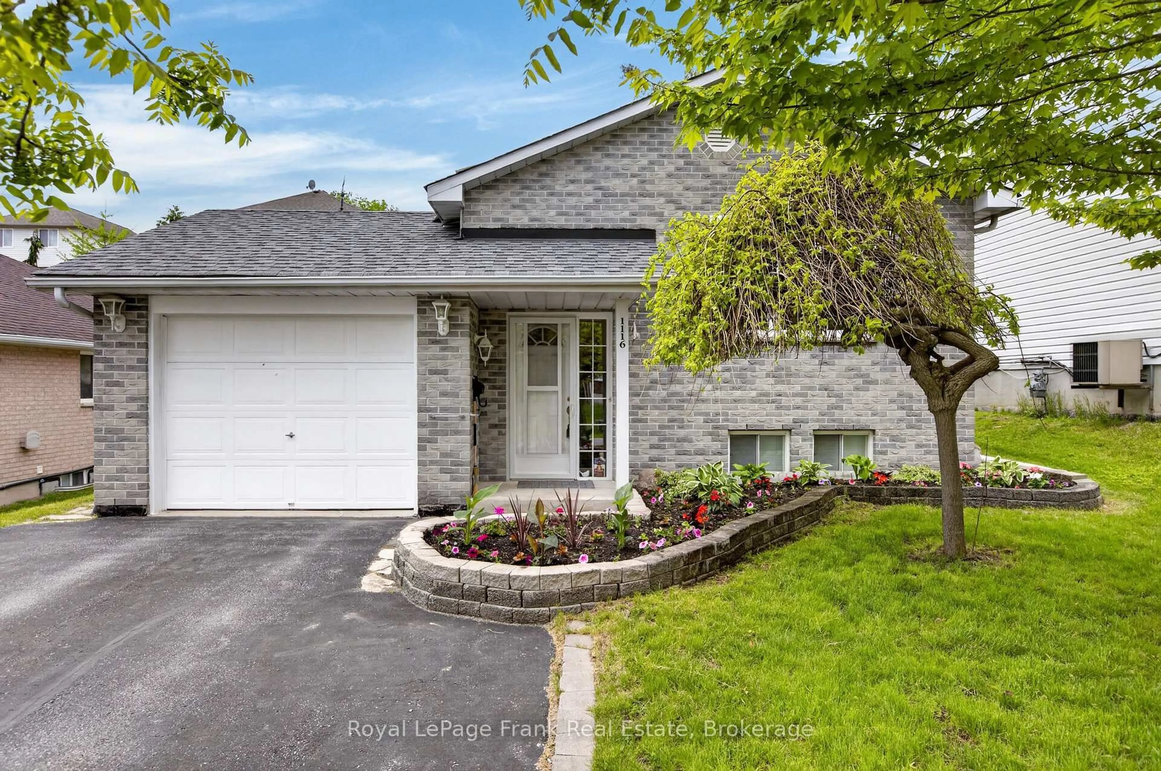 Home with brick exterior material, street for 1116 Afton Rd, Peterborough Ontario K9J 8L2