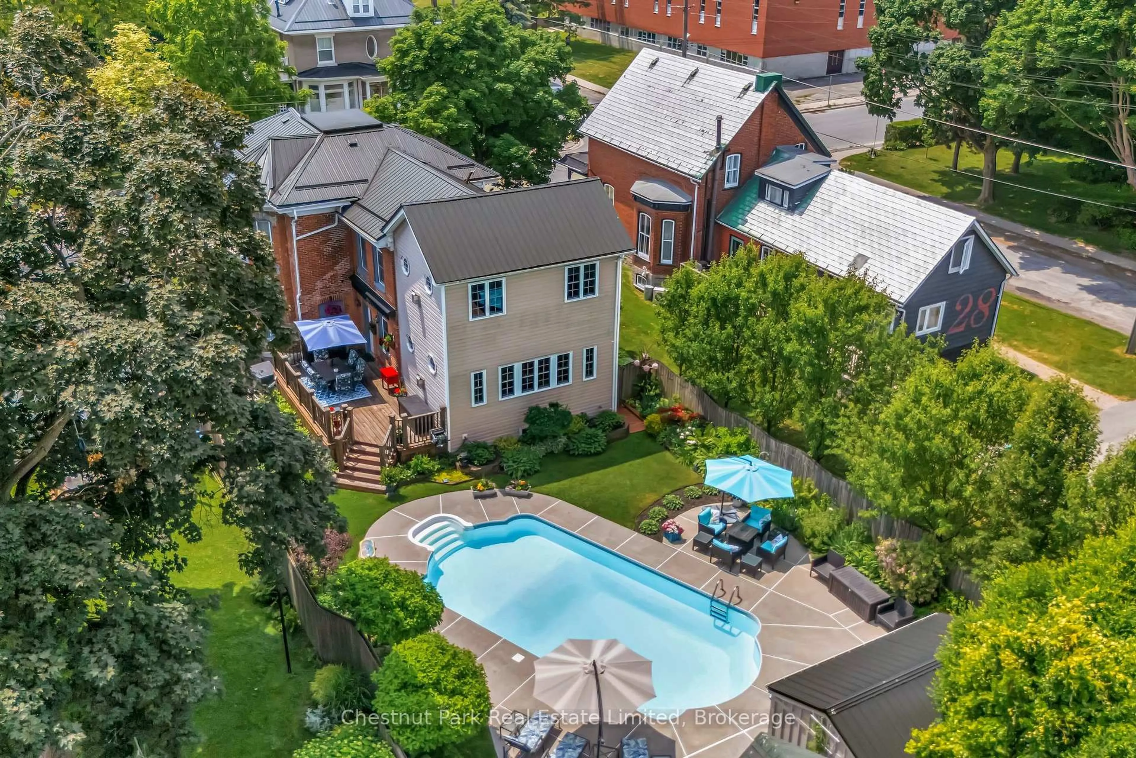 A pic from outside/outdoor area/front of a property/back of a property/a pic from drone, unknown for 26 Centre St, Prince Edward County Ontario K0K 2T0