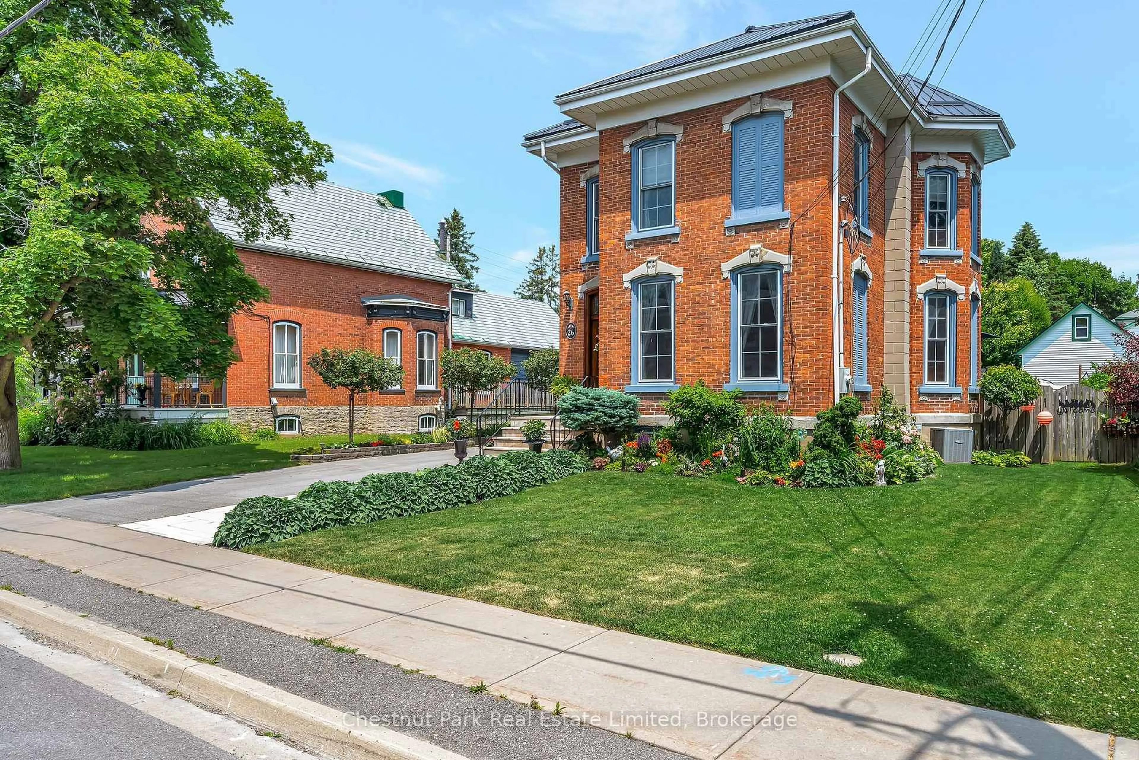Home with brick exterior material, street for 26 Centre St, Prince Edward County Ontario K0K 2T0