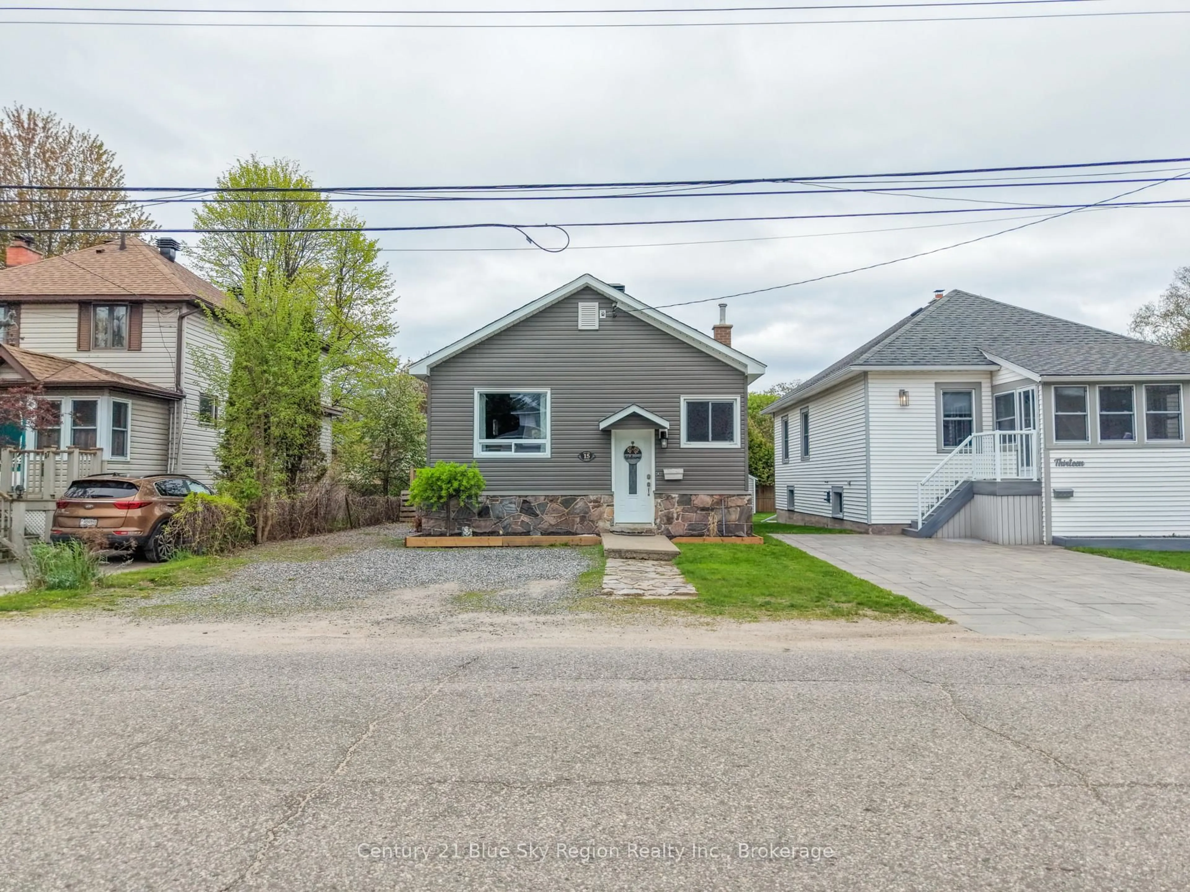 A pic from outside/outdoor area/front of a property/back of a property/a pic from drone, street for 15 Pollard Ave, North Bay Ontario P1A 1Z4