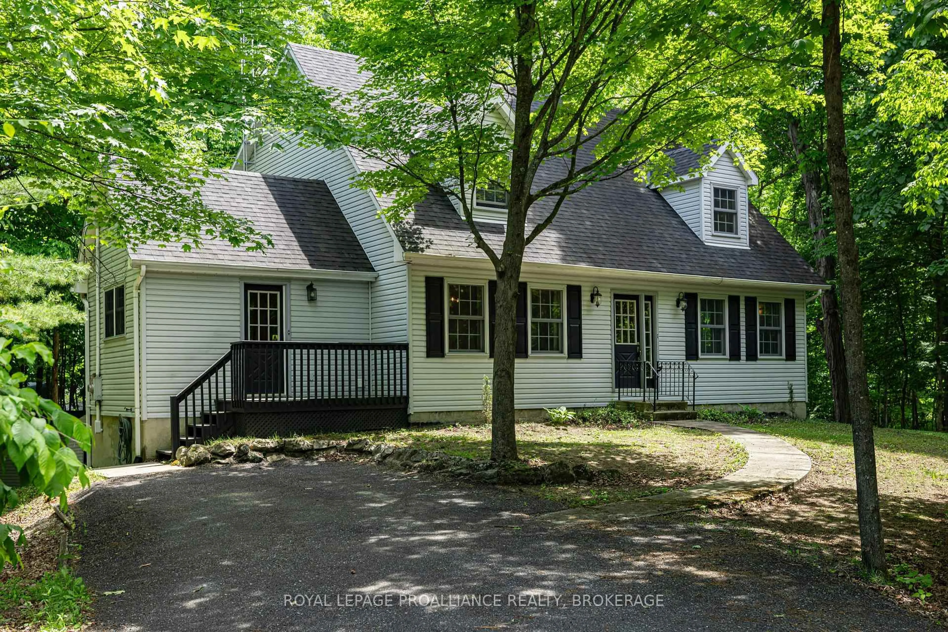 Home with vinyl exterior material, street for 1403 Norway Rd, Perth Road Ontario K0H 2L0