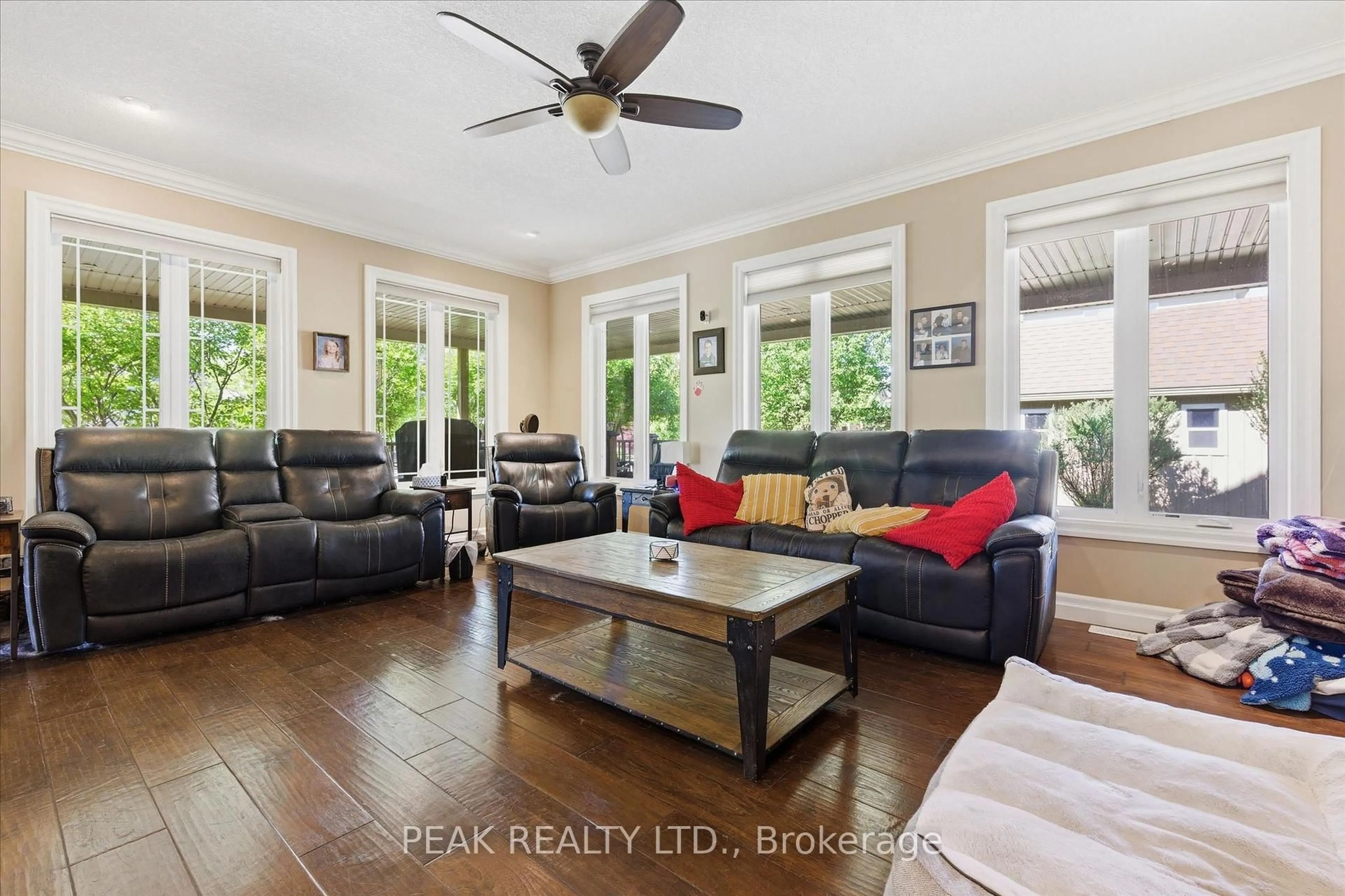 Living room with furniture, wood/laminate floor for 901 Valebrook Crt, Kitchener Ontario N2A 0E5