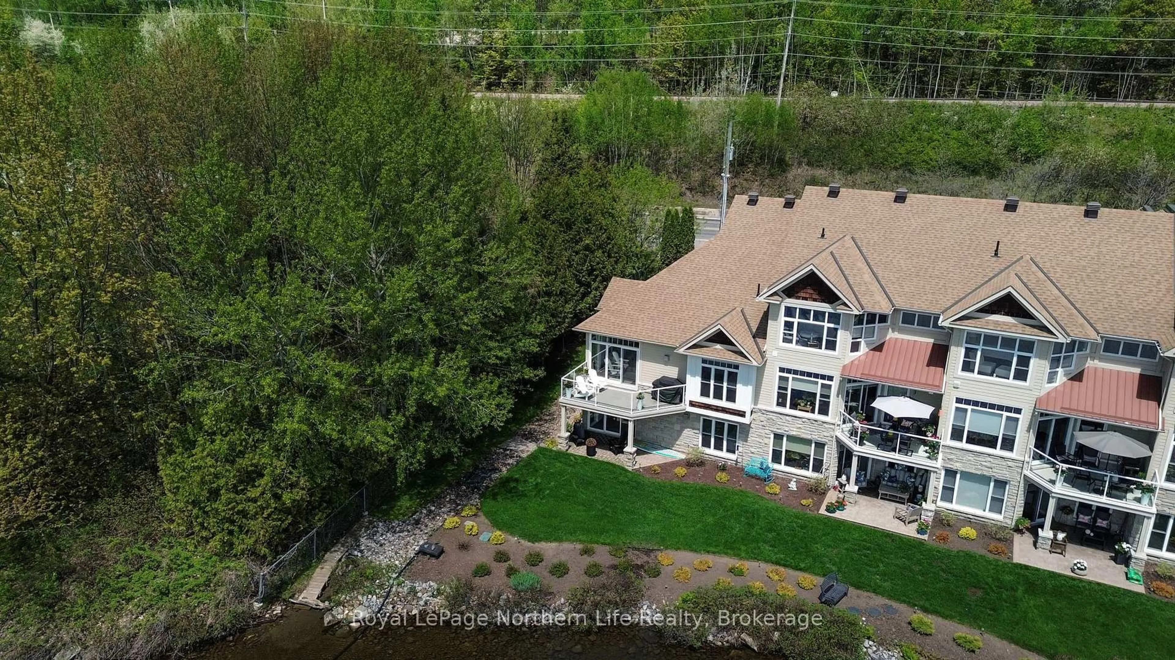 A pic from outside/outdoor area/front of a property/back of a property/a pic from drone, water/lake/river/ocean view for 3477 Trout Lake Rd #6, North Bay Ontario P1A 0B4