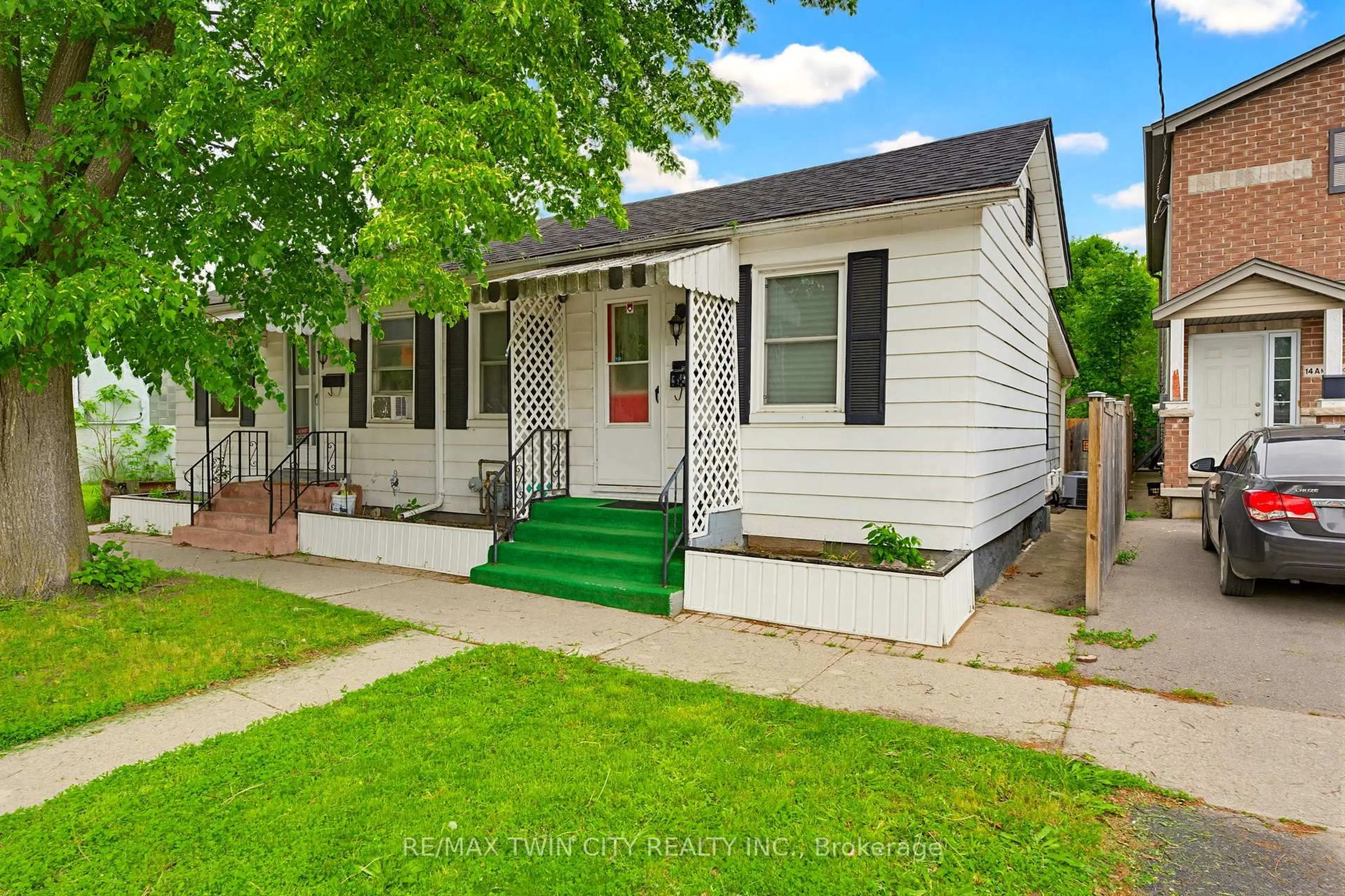 Home with vinyl exterior material, street for 12 Marlborough St, Brantford Ontario N3T 2R8