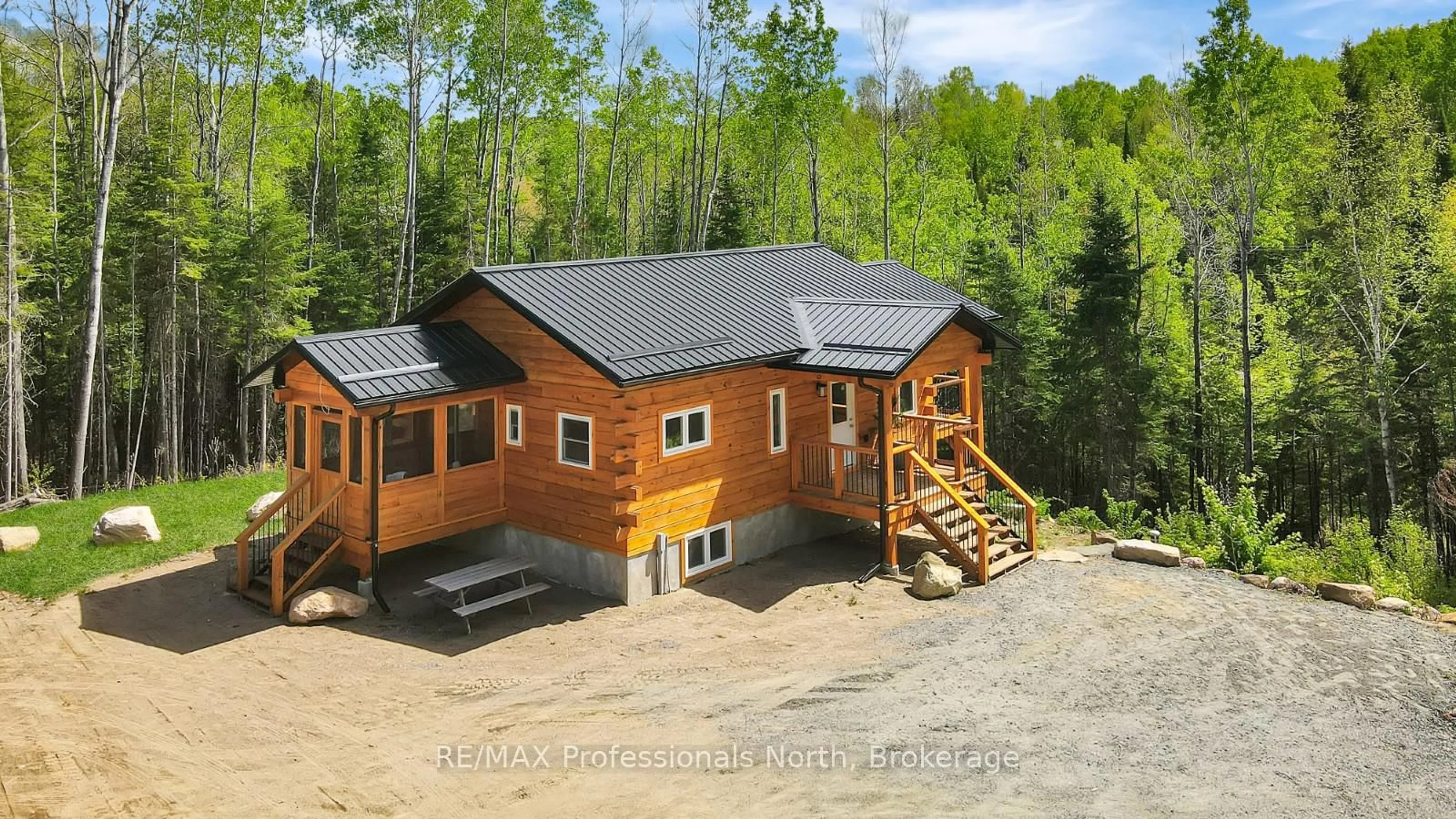 A pic from outside/outdoor area/front of a property/back of a property/a pic from drone, building for 6587 Elephant Lake Rd, Dysart et al Ontario K0L 1X0