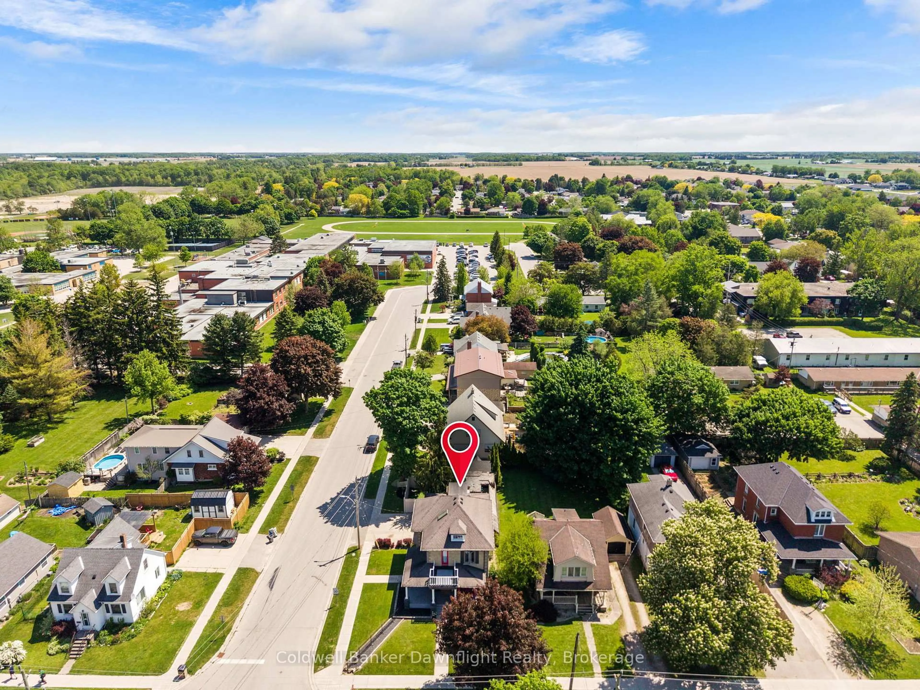 A pic from outside/outdoor area/front of a property/back of a property/a pic from drone, street for 278 Andrew St, South Huron Ontario N0M 1S2