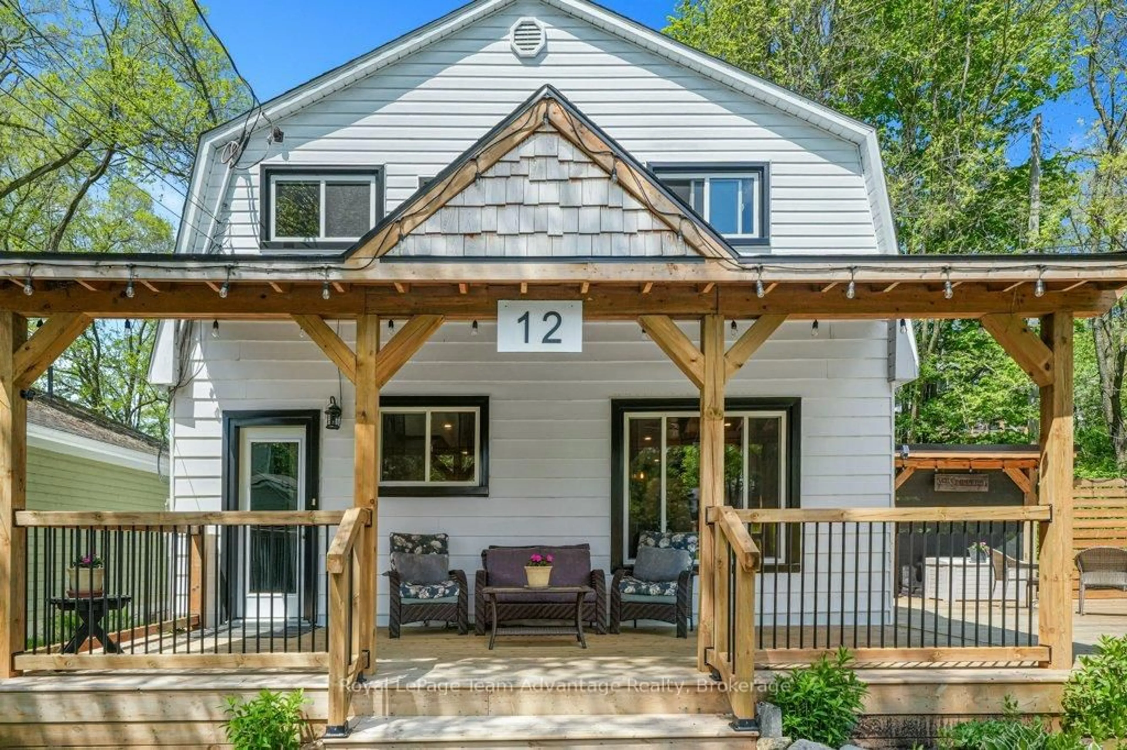 Home with vinyl exterior material, street for 12 Victoria Ave, Parry Sound Ontario P2A 2C1