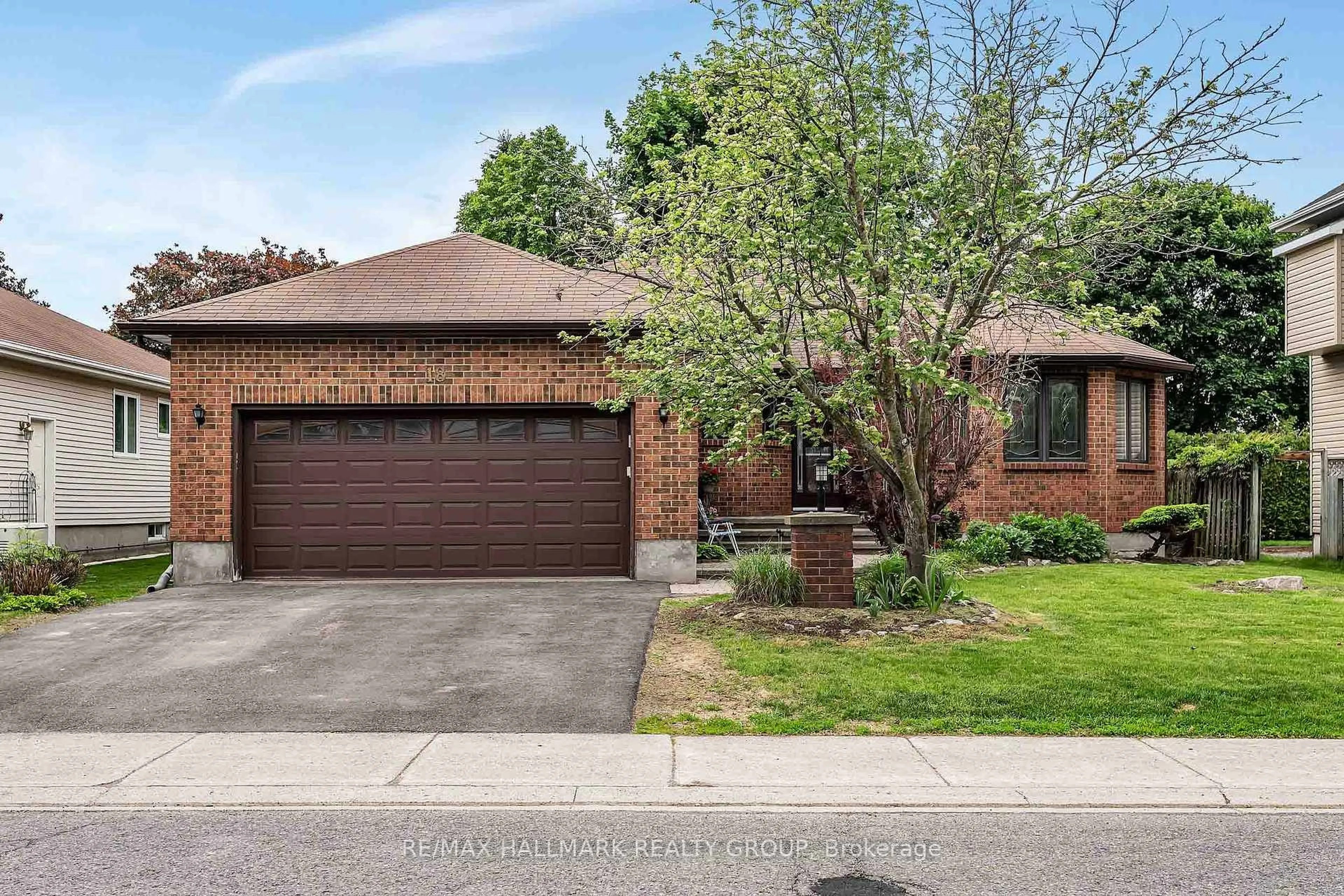Home with brick exterior material, street for 18 Randall James Dr, Ottawa Ontario K2S 1L9
