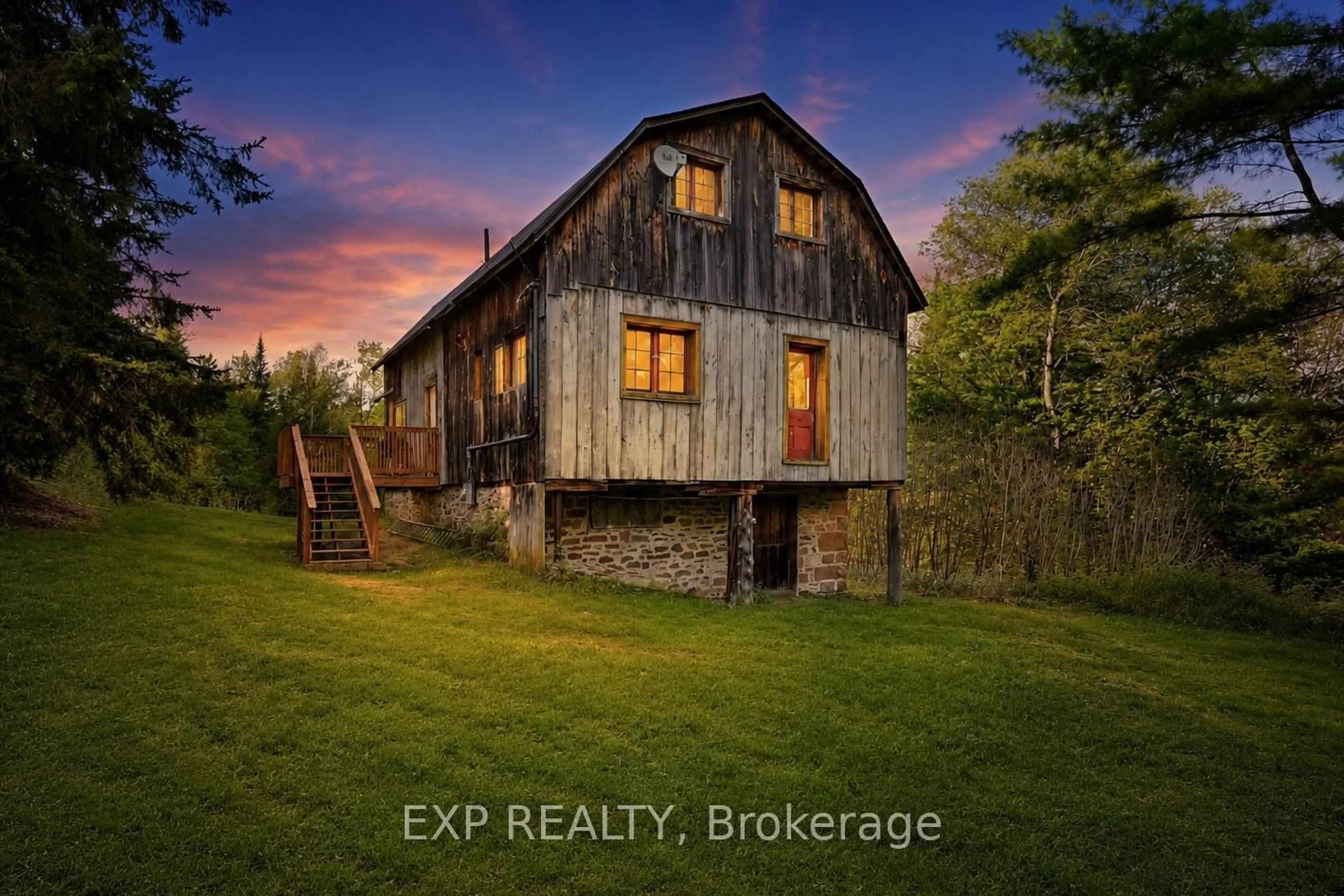 A pic from outside/outdoor area/front of a property/back of a property/a pic from drone, building for 1057 Macduff Rd, Highlands East Ontario K0L 2Y0
